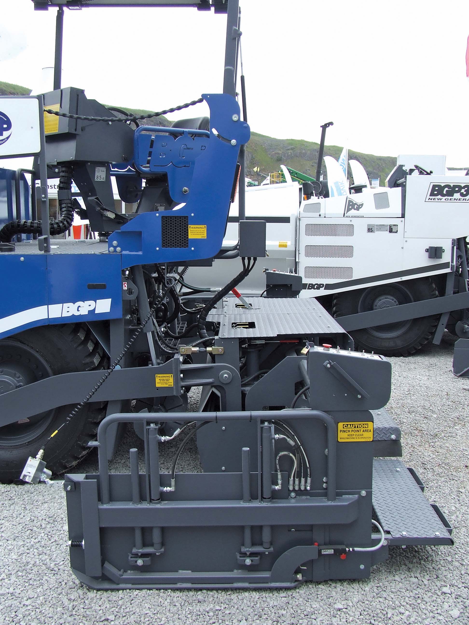 BG Pavers offers its BGP 308 wheeled paver with either a tamper bar of vibratory screed BG Pavers low emission diesels