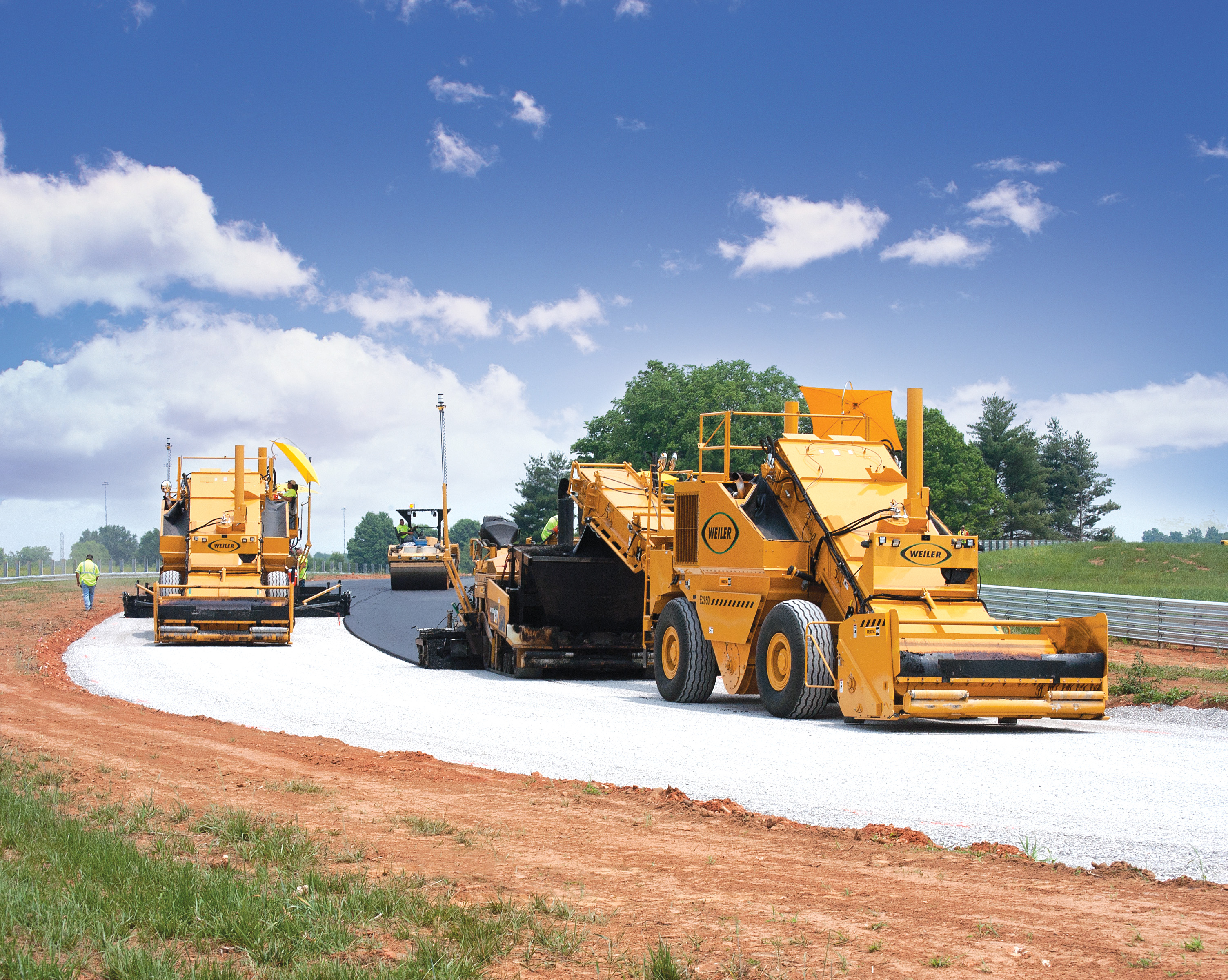 Weiler MTVs were used to feed the pavers continuously Weiler MTVs