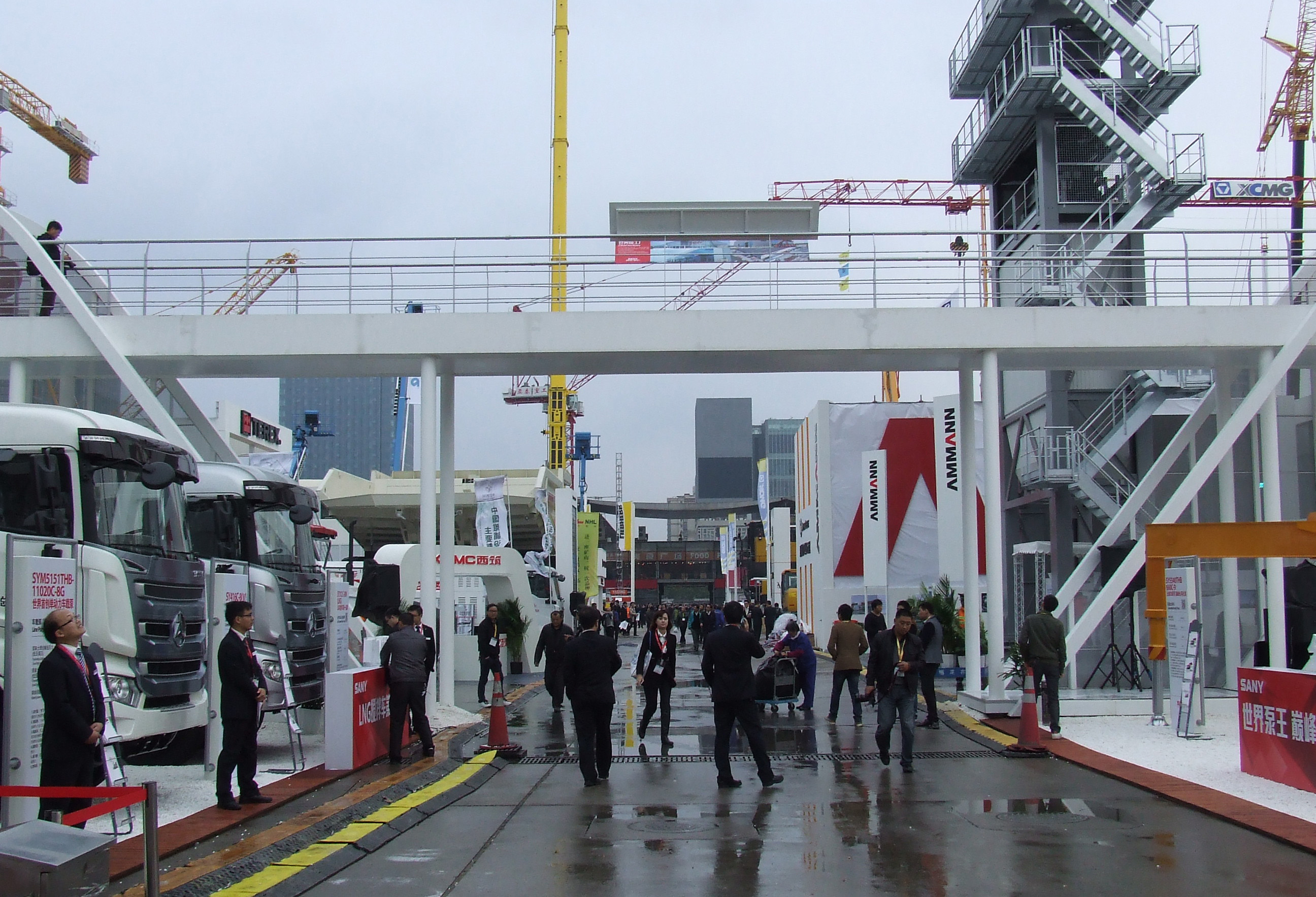 Rain showers on the first day failed to dampen the enthusiasm to see new construction machines at bauma China bauma China 2014 show