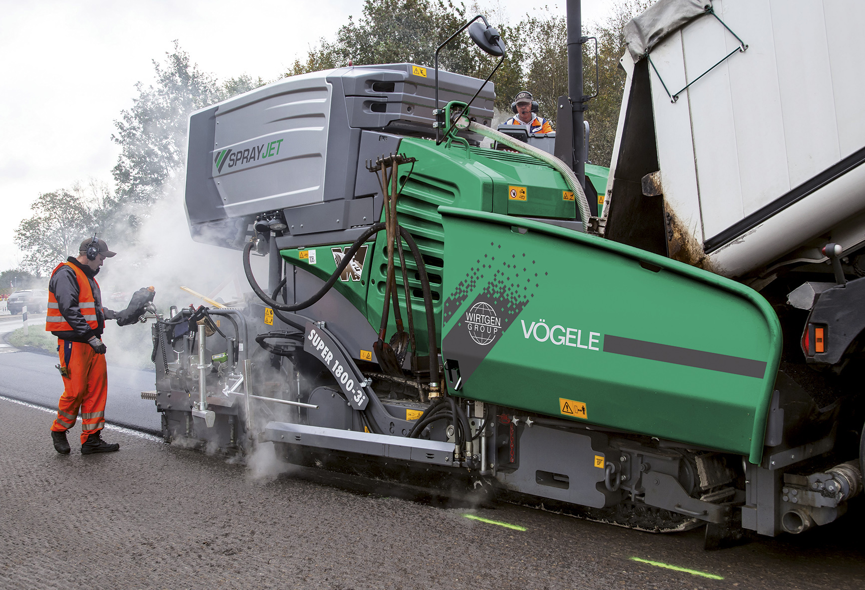 Vögele is introducing a new generation SprayJet machine Vögele Super 1800-3i asphalt paver