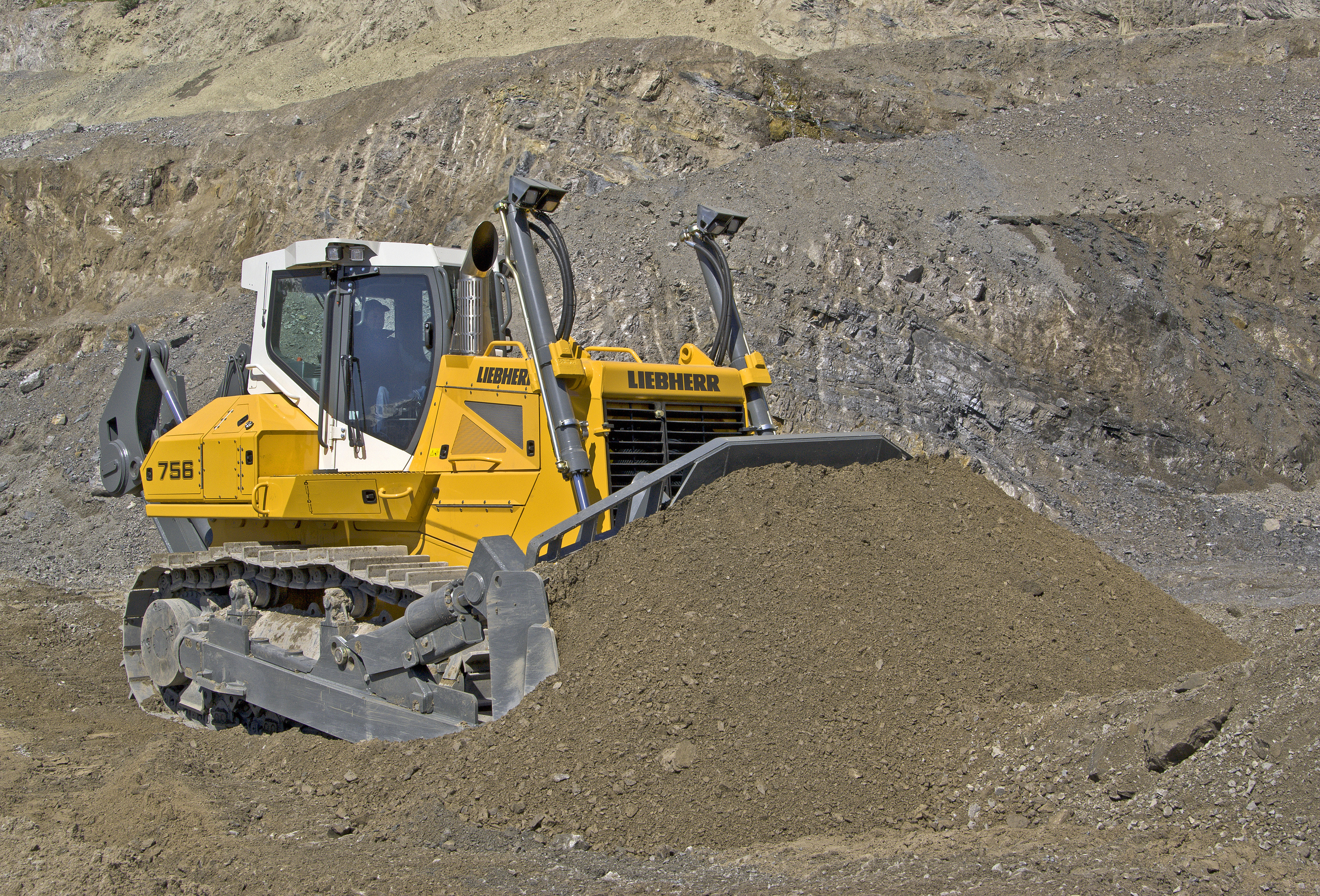The Liebherr PR 756 Litronic crawler tractor performing gravel extraction Liebherr PR 756 Litronic crawler tractor
