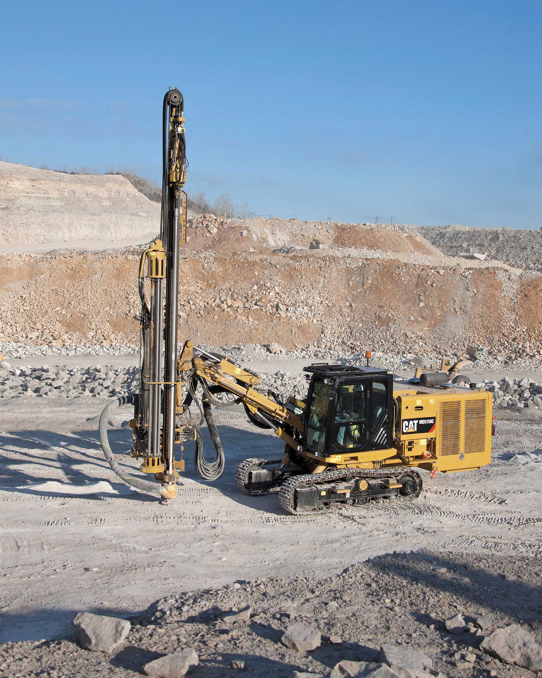 Caterpillar MD5150C Top Hammer Drill working at Tower Rock Caterpillar MD5150C Top Hammer Drill