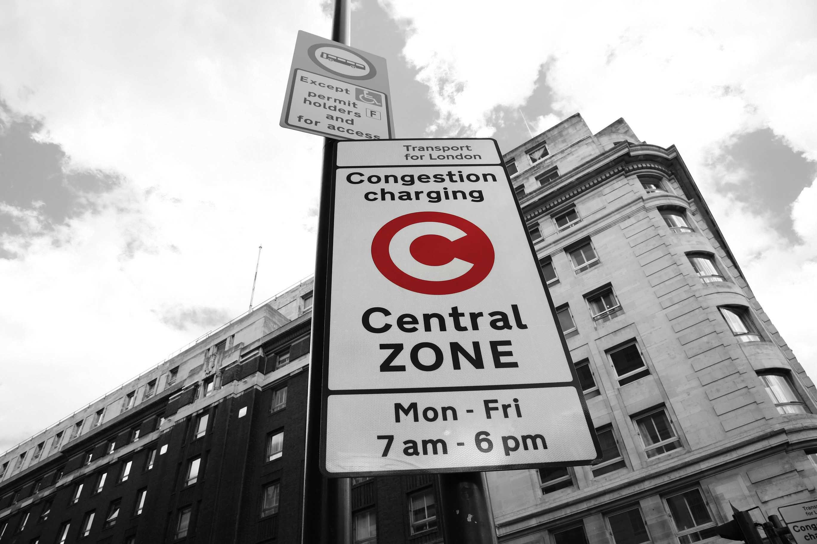 London’s congestion charge has helped lower traffic volumes in the city, cutting jams London’s congestion charge sign