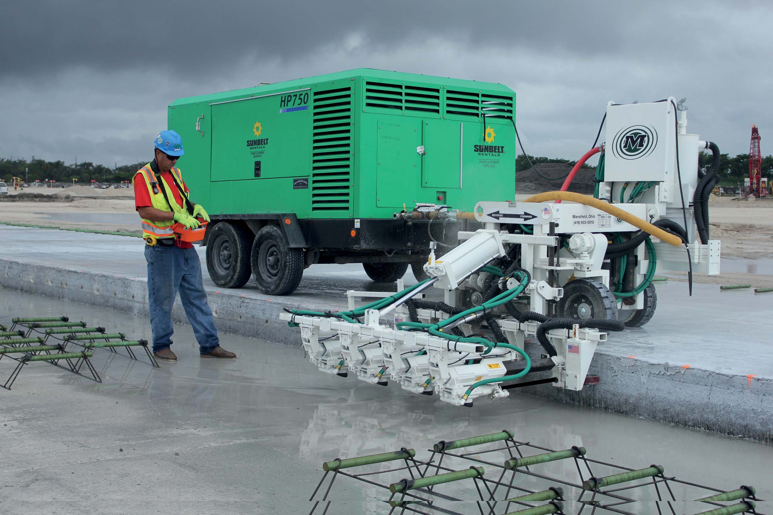 The Minnich machine can be controlled remotely, allowing the operator to stand at a safe distance while also allowing good views of the working area Minnich machine can be controlled remotely