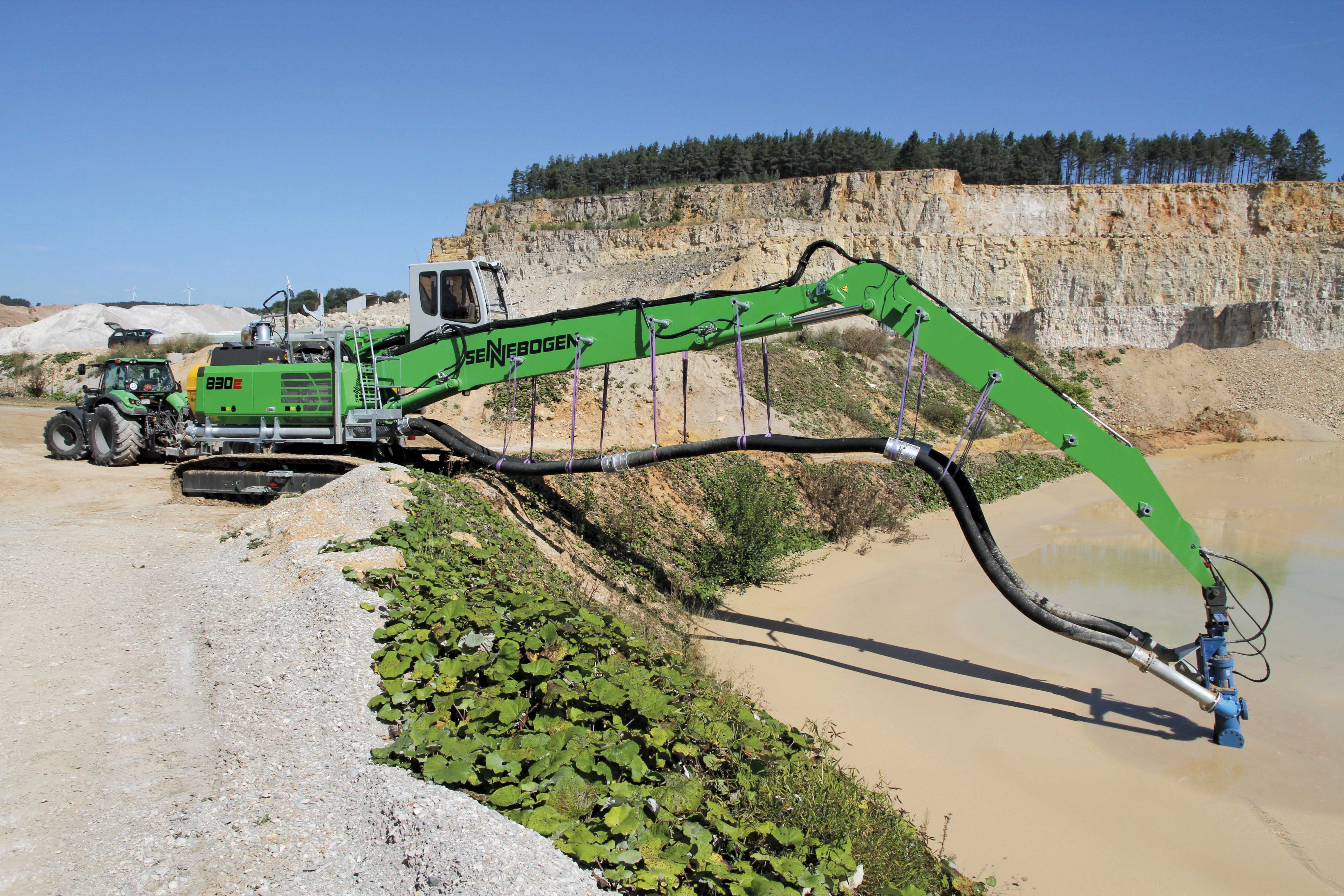 Sennebogen: suction excavator pumping dolomite grit Sennebogen excavator pumping dolomite grit