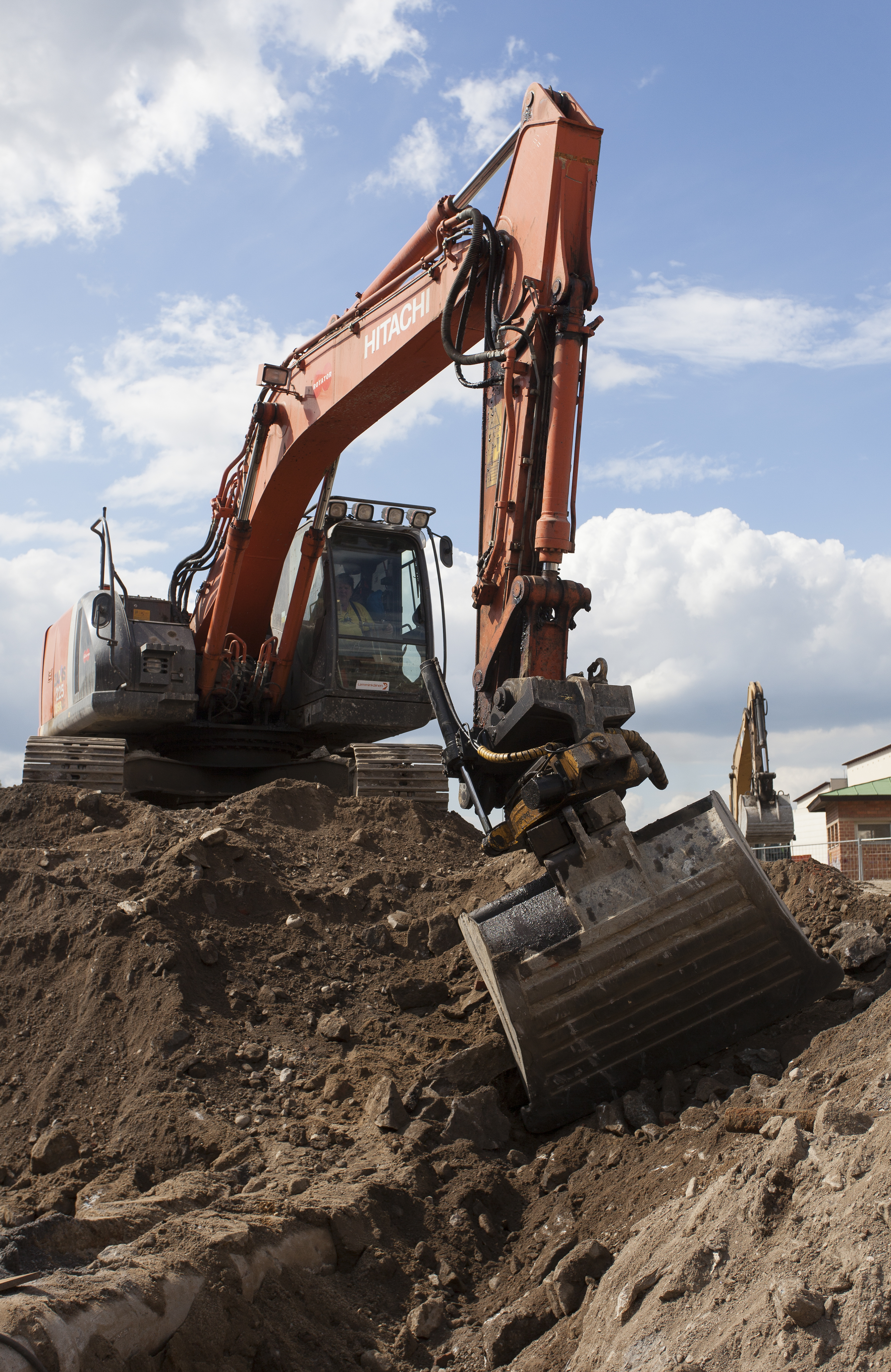 A substantial earthmoving operation has been carried out on the surface Hitachi excavator
