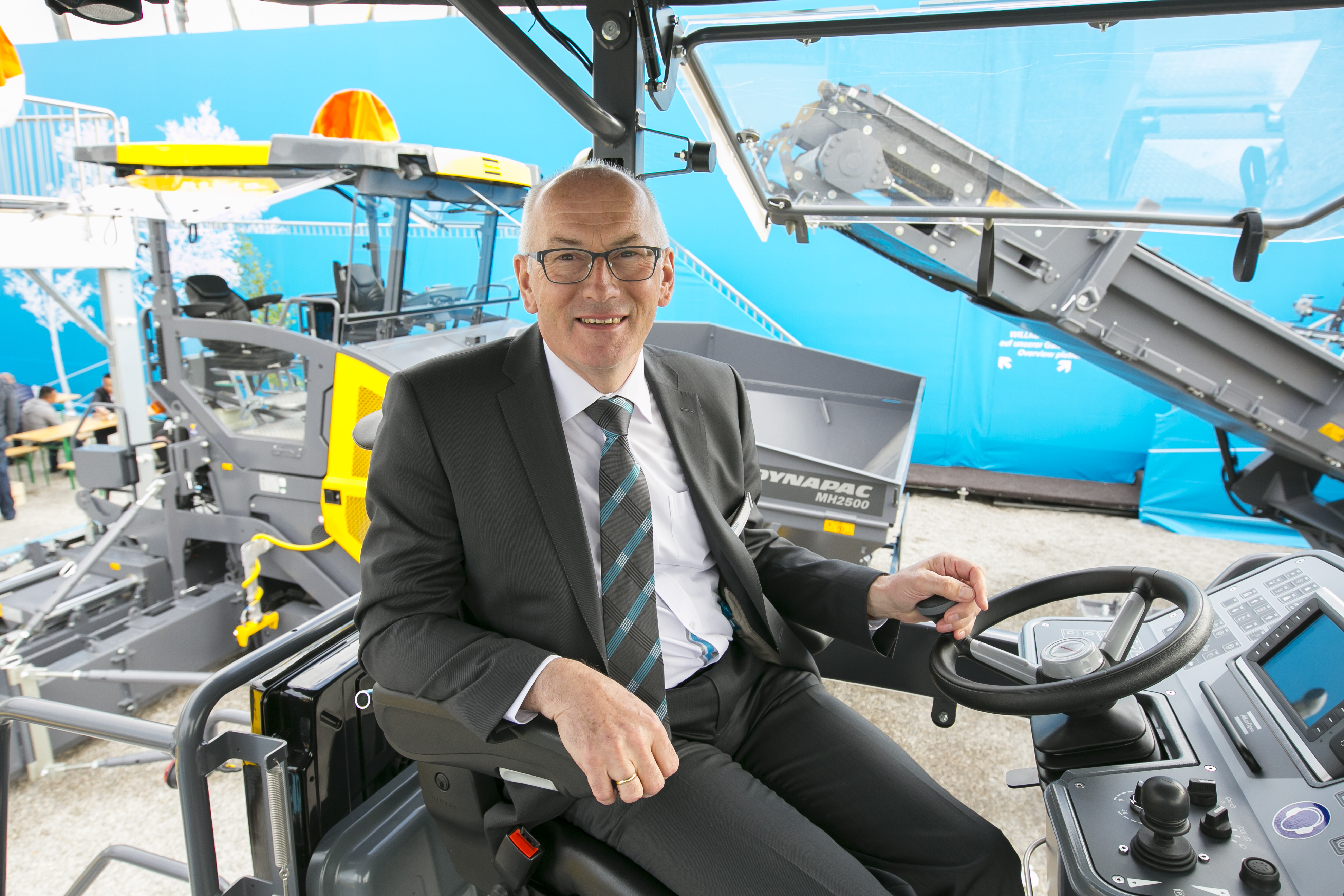 Herman Matthyssen, Atlas Copco Road Construction vice president marketing, on board one of Atlas Copco’s state-of-the-art pavers at bauma 2016 Herman Matthyssen, Atlas Copco