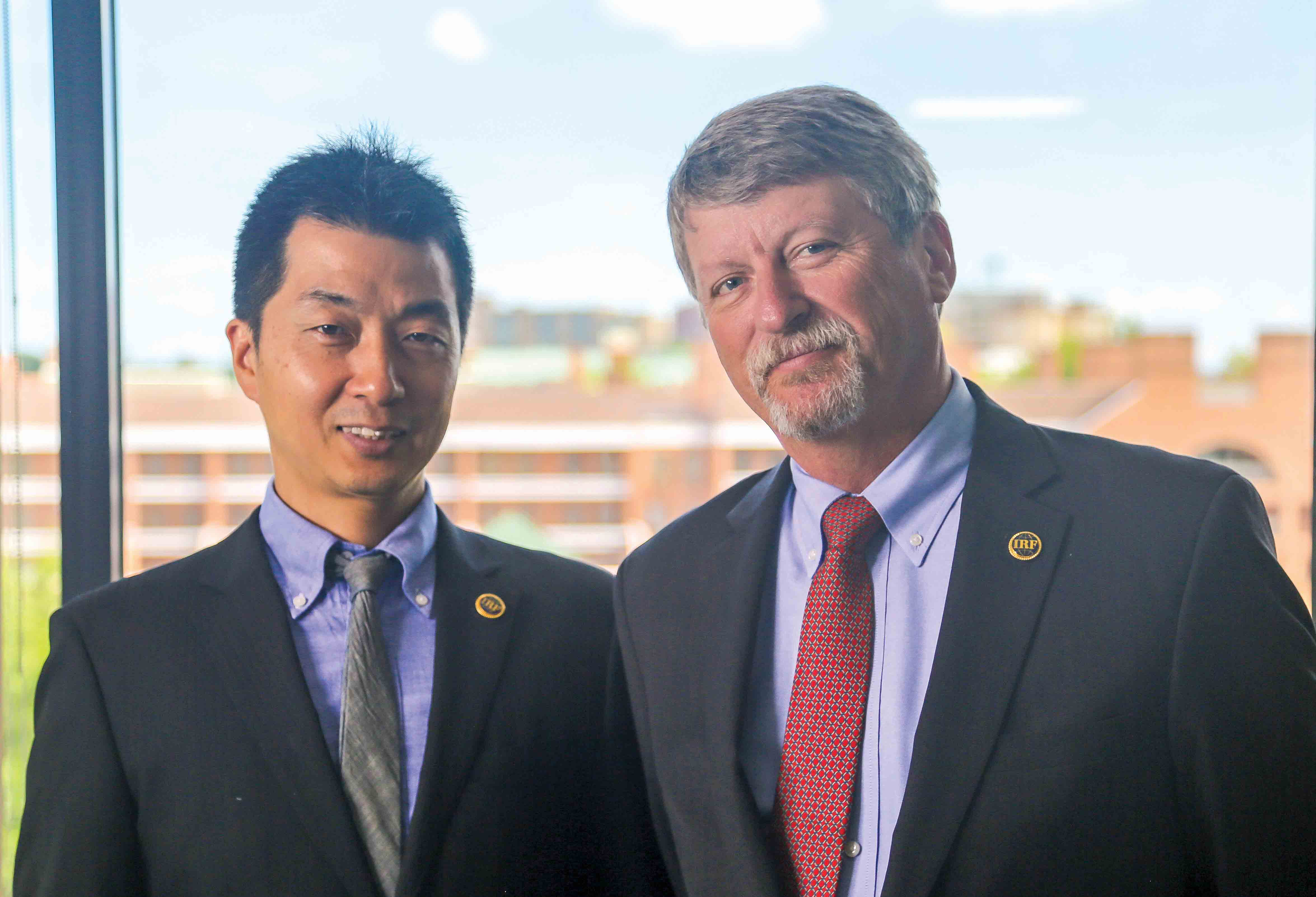 Nexco West USA President & CEO Masato Matsumoto, left, with Lindsay Transportation Solutions Senior Vice President Chris Sanders Nexco West with Chris Sanders, Lindsay