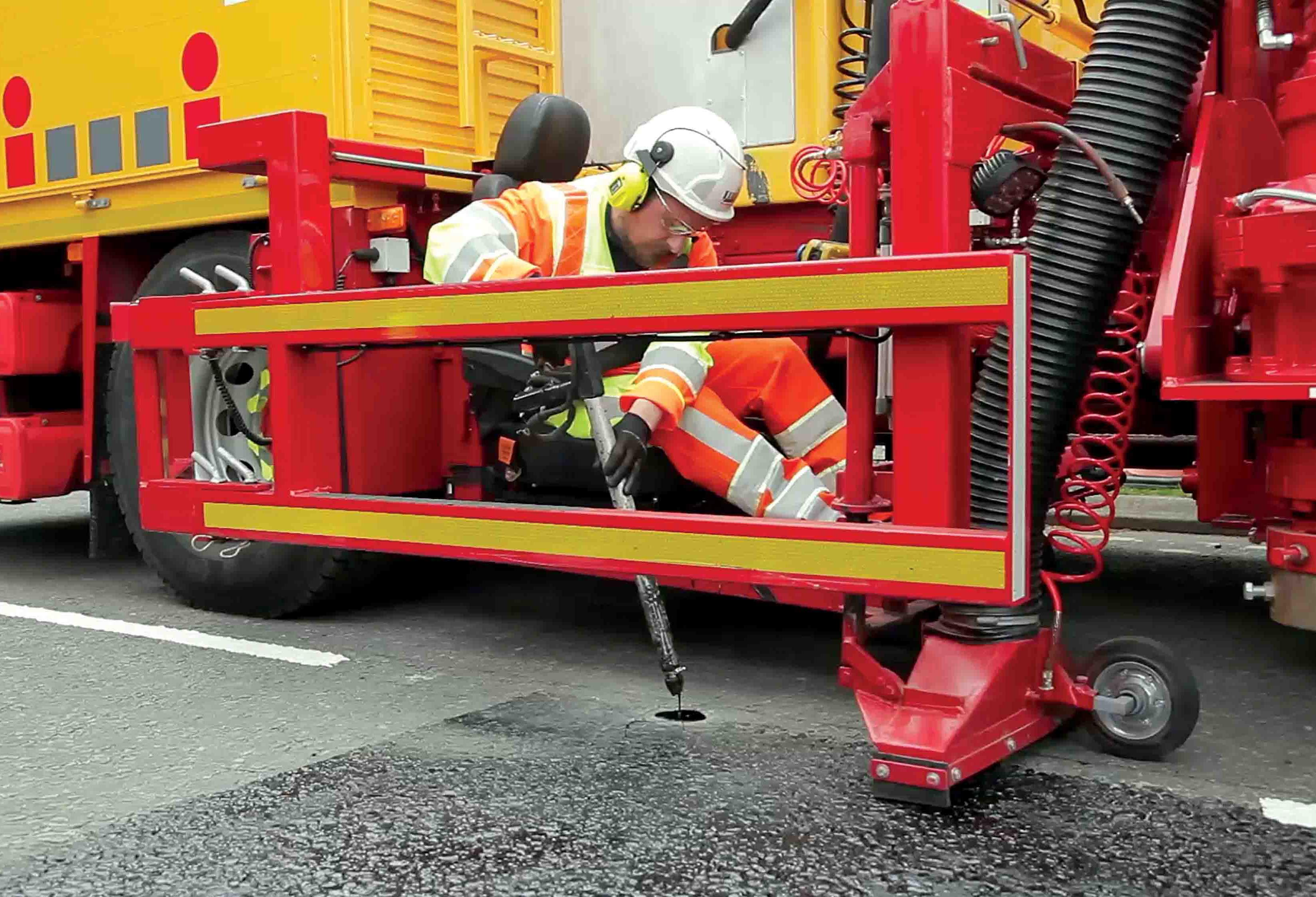 Installation operatives out of harm's way WJ Guardian road stud installation