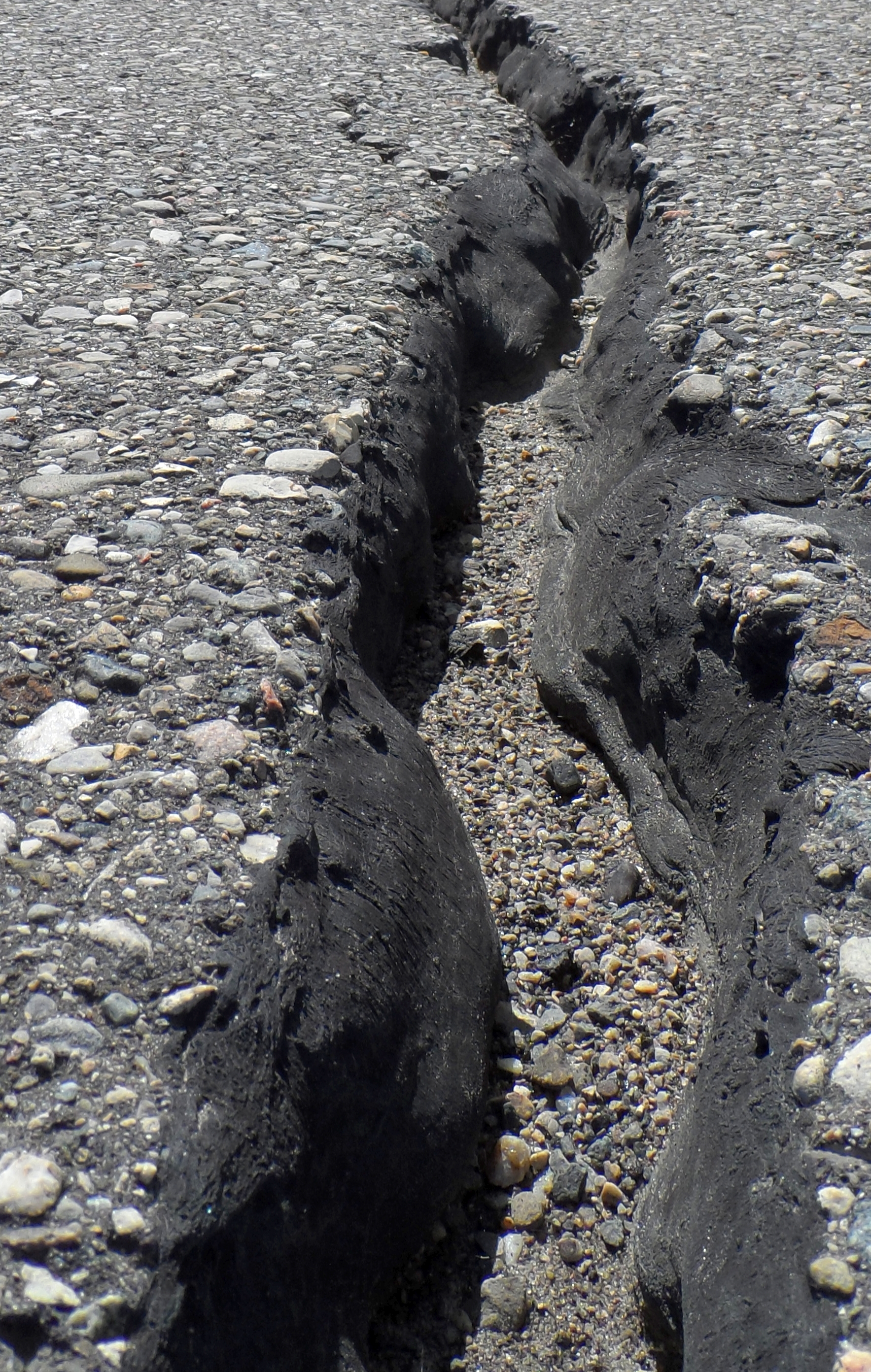 A chilling sight: good binder selection in cold climates is essential for keeping life-cycle costs under control Transtec cracked pavement