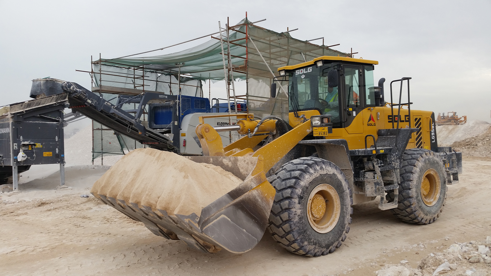SDLG wheeled loaders are said to deliver high reliability at a Qatar quarry SDLG wheel loaders