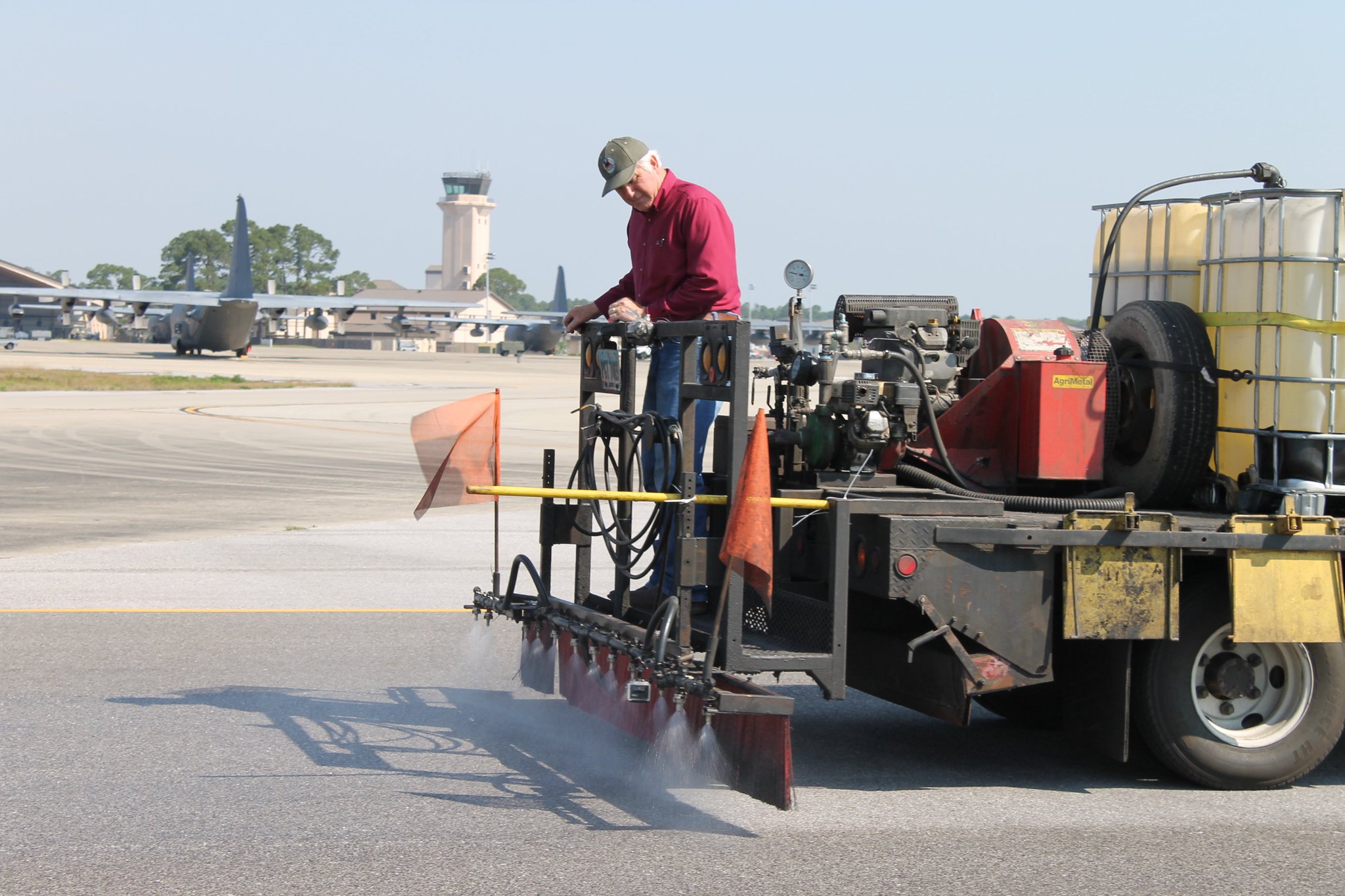 Biorestor makes use of soybean oil and other bio-based products to protect and rejuvenate pavement surfaces Biorestor spraying 2.jpg