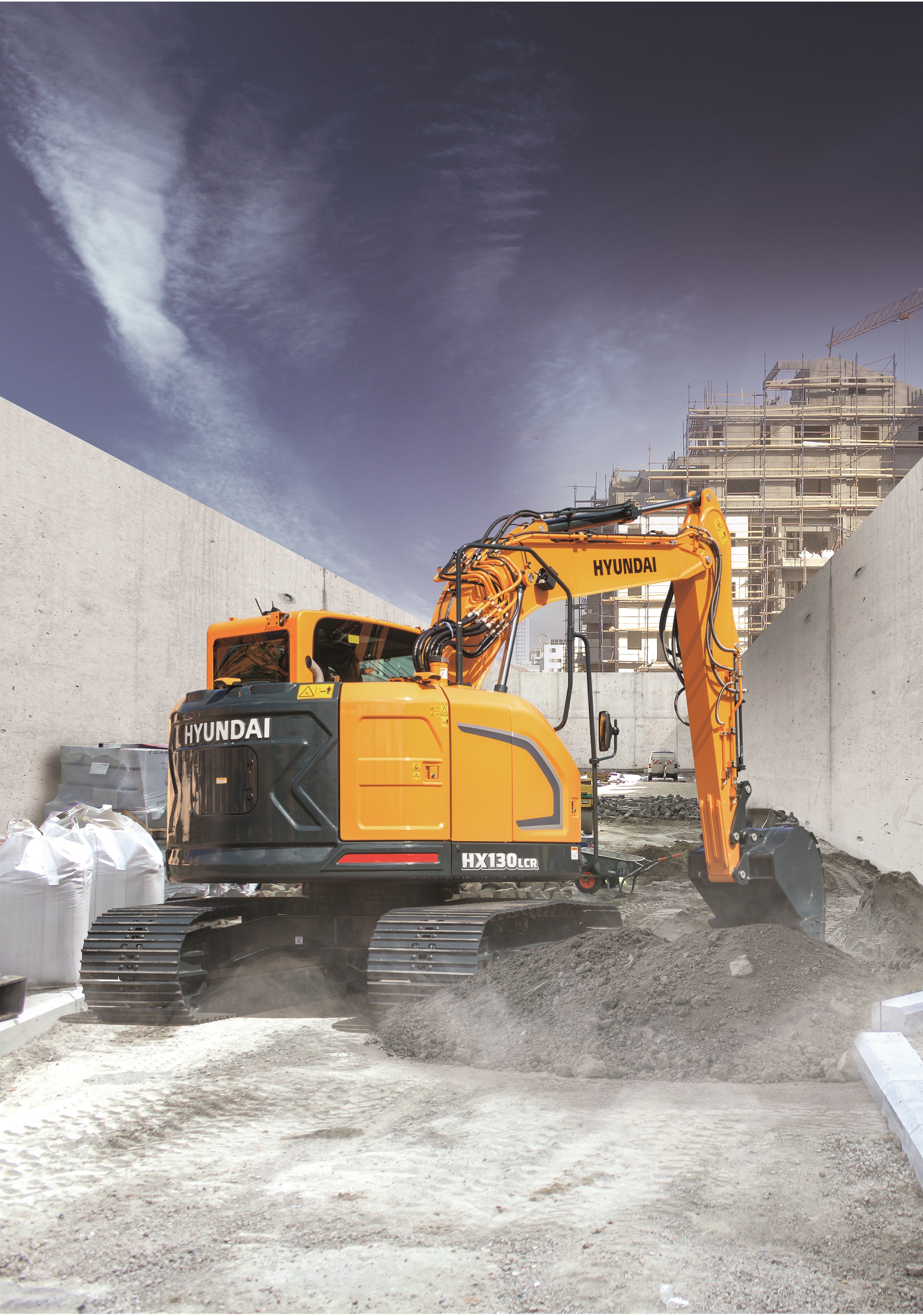 The HX130 LCR is the third compact-radius excavator model in Hyundai’s HX series Hyundai-ScotPlant-YoungPlant-HX130LCR_back right view.jpg