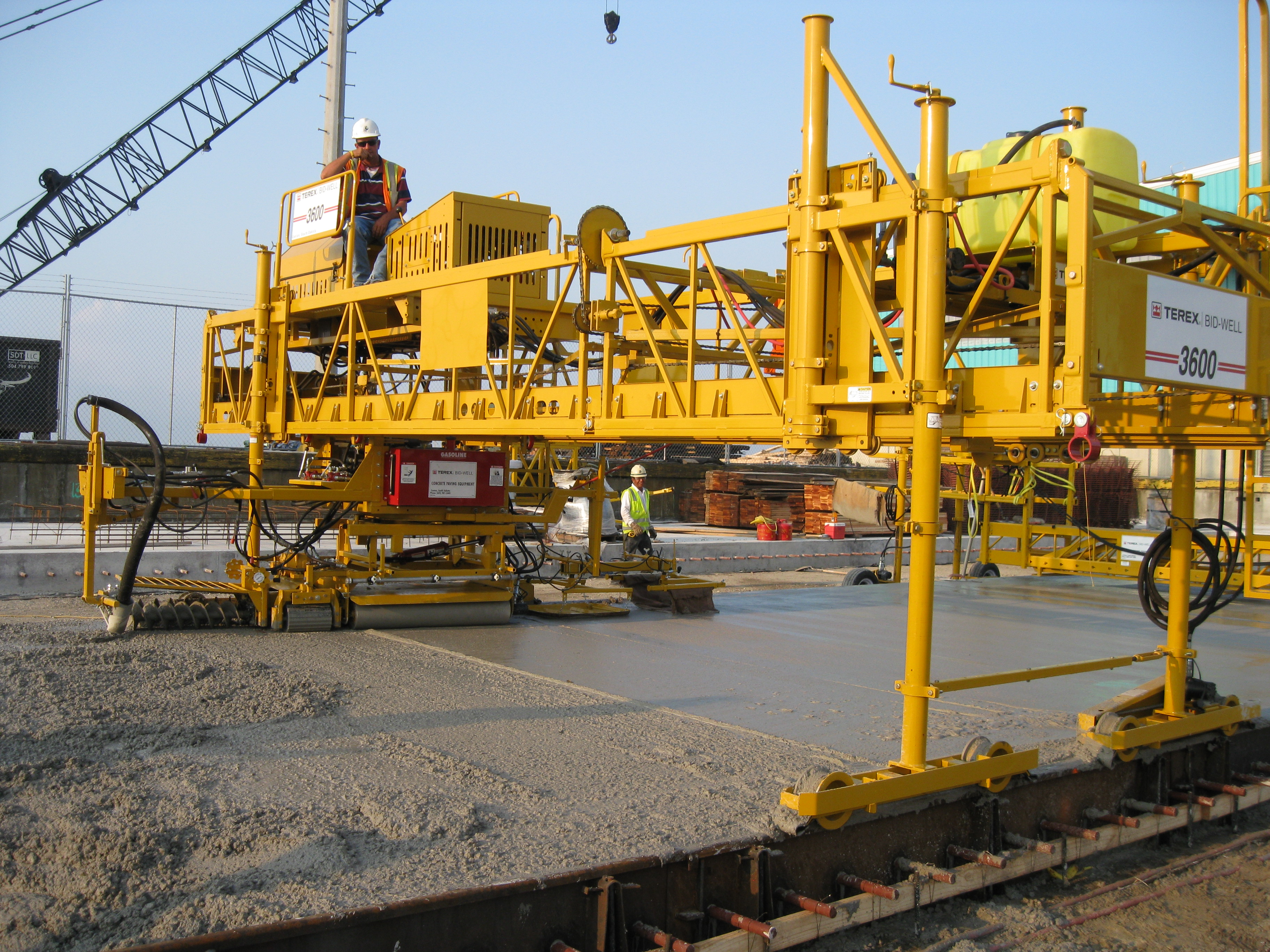 A barge-mounted Manitowoc MLC300 at work on the new 750m-long Dale Gardner Veterans Memorial Bridge in Illinois terexbidwell3600 paver - bridge overlay (2).jpg