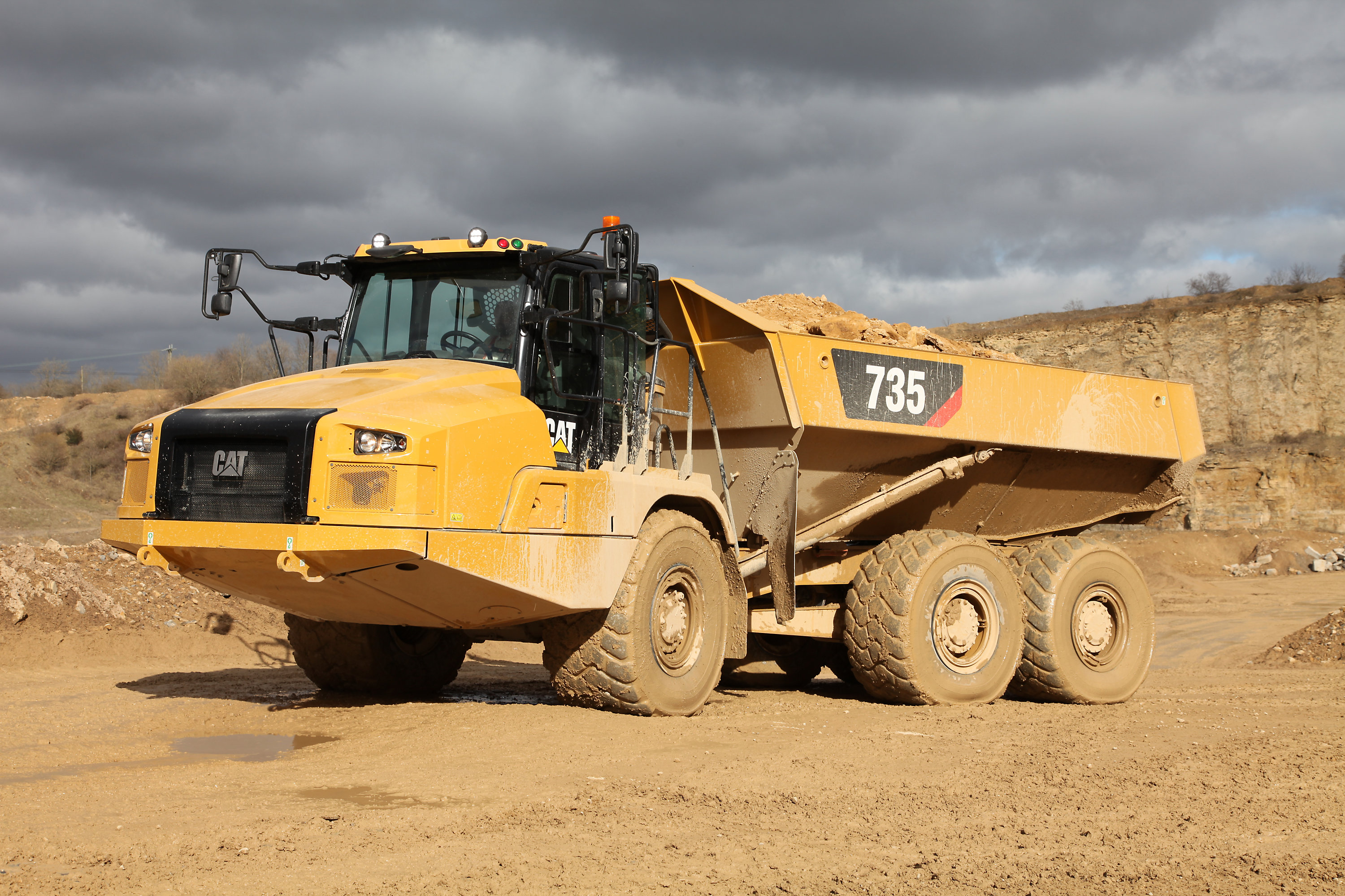 Improved cycle times and lower cost/tonne are key benefits for the upgraded Caterpillar ADT models CAT truck upgrades-Cat 735 articulated truck..jpg