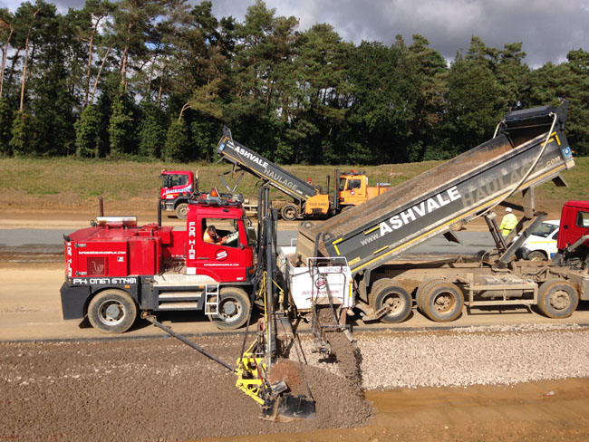 Trucks delivered material and tipped it directly into the Sidewinder’s offset hopper which transferred material to the prepared area PIC-1 - Main Pic 650.jpg