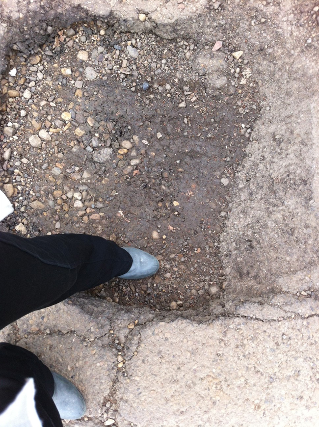 Cracks in road surfaces should be addressed before they deteriorate further into more serious pothole problems Pothole-Edmonton-2.jpeg