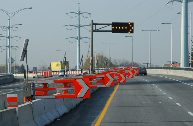 SwiftGates in operation on the Galipeault Bridge near Montreal, Canada Versilis - Swift and Swing.jpg