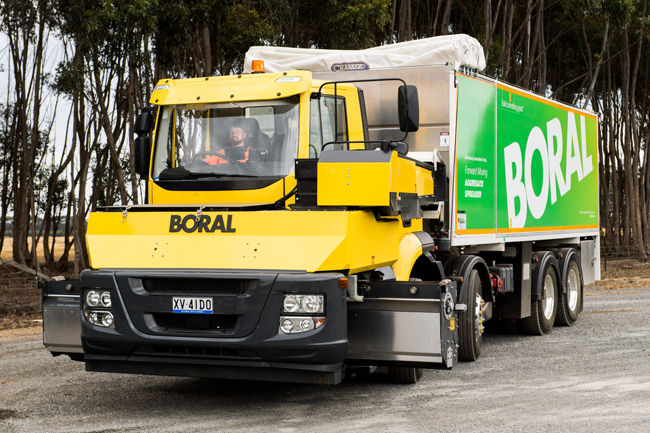 The Boral FMAS - Forward Moving Aggregate Spreader: a joint development with truck manufacturer Iveco in Australia Boral - Aggregate Truck Spreader.jpg