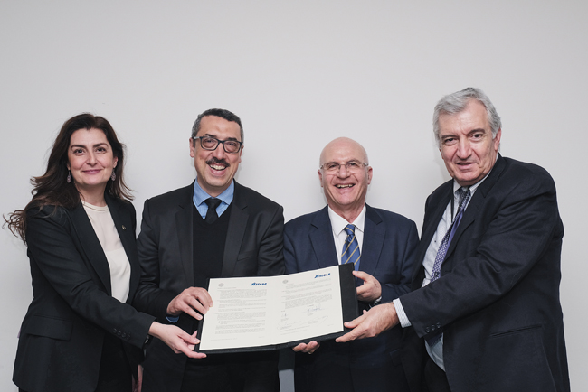 IRF Geneva and asecap sign agreement – from left to right: Susanna Zammataro; Anouar Benazzouz; Bill Halkias; Kallistratos Dionellis MoU_Asecap_Group.jpg