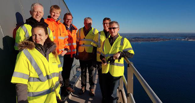 On a high: Niels Pederson (far right) and part of his team 254m above sea level on a pylon of the Storebælt Bridge – the highest point of any self-supporting structure in Denmark FEATURE - Thought Leader - Denmark - 1.png
