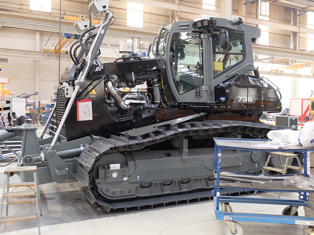 The majority of machines made in the LWT facility are yellow for Liebherr or Green for Claas, although customers can order special colours such as this black dozer The majority of machines made in the LWT facility are yellow for Liebherr or Green for Claas, although customers can order special colours such as this black dozer