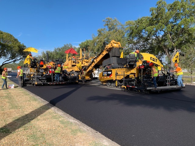 In all, 21,772 tonnes of asphalt were paved over 77,724m in echelon (image courtesy Gardner-Gibson)
