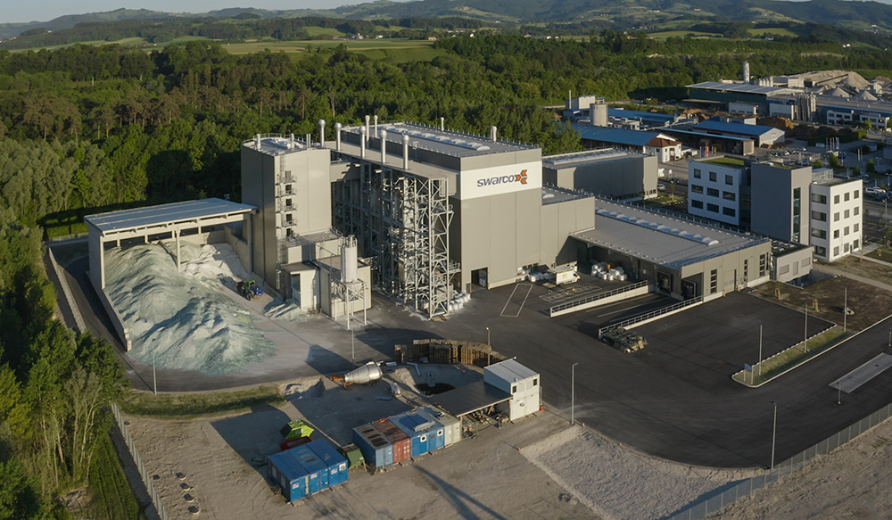 Bird’s eye view of the new premises of the SWARCO Global Glass Beads Technology Centre in Neufurth / Austria. Bird’s eye view of the new premises of the SWARCO Global Glass Beads Technology Centre in Neufurth / Austria.