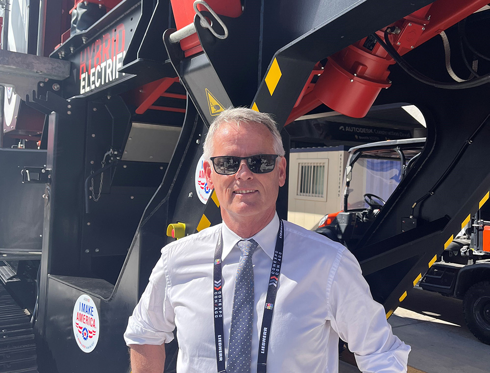 Erwin Schneller, SBM Mineral Processing managing director, in front of the JAWMAX 400 jaw crusher Erwin Schneller, SBM Mineral Processing managing director, in front of the JAWMAX 400 jaw crusher
