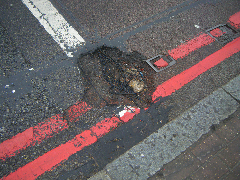 Even main roads on busy UK city streets suffer serious wear and tear Even main roads on busy UK city streets suffer serious wear and tear