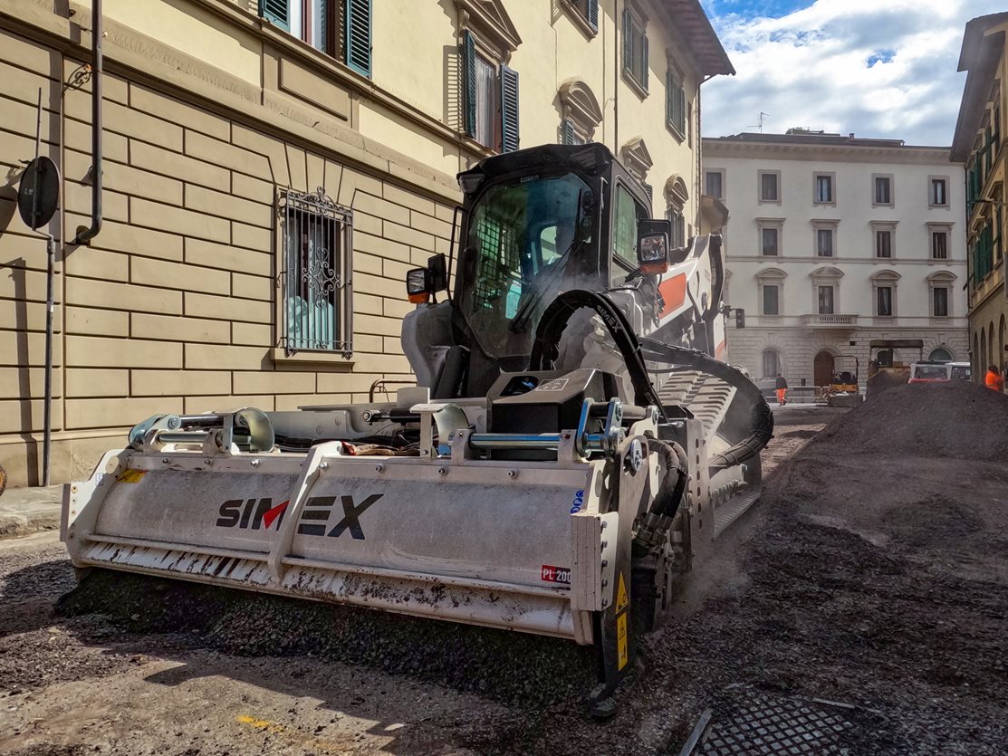 Wide work for a Simex PL 2000 hooked up to a Bobcat T86 skid steer loader in Florence