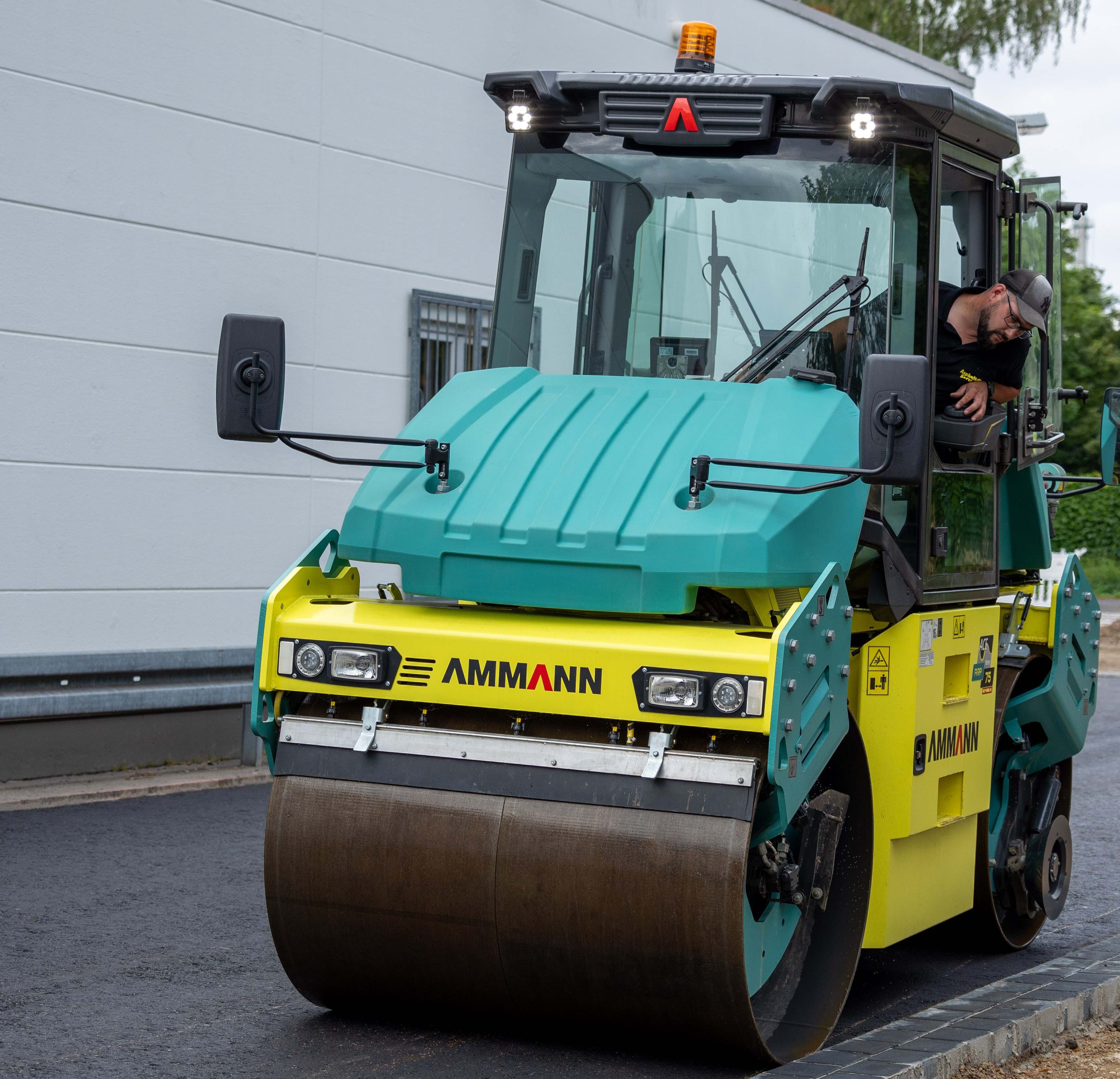 An Ammann twin drum roller has been used to carry out a tricky compaction job in a supermarket carpark