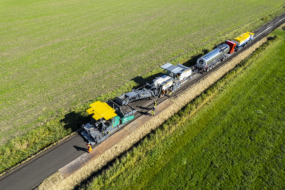 Granulation, mixing and paving in a single pass: the Wirtgen Group cold recycling train sustainably and efficiently rehabilitated an agricultural road in the Netherlands while saving resources. Granulation, mixing and paving in a single pass: the Wirtgen Group cold recycling train sustainably and efficiently rehabilitated an agricultural road in the Netherlands while saving resources.