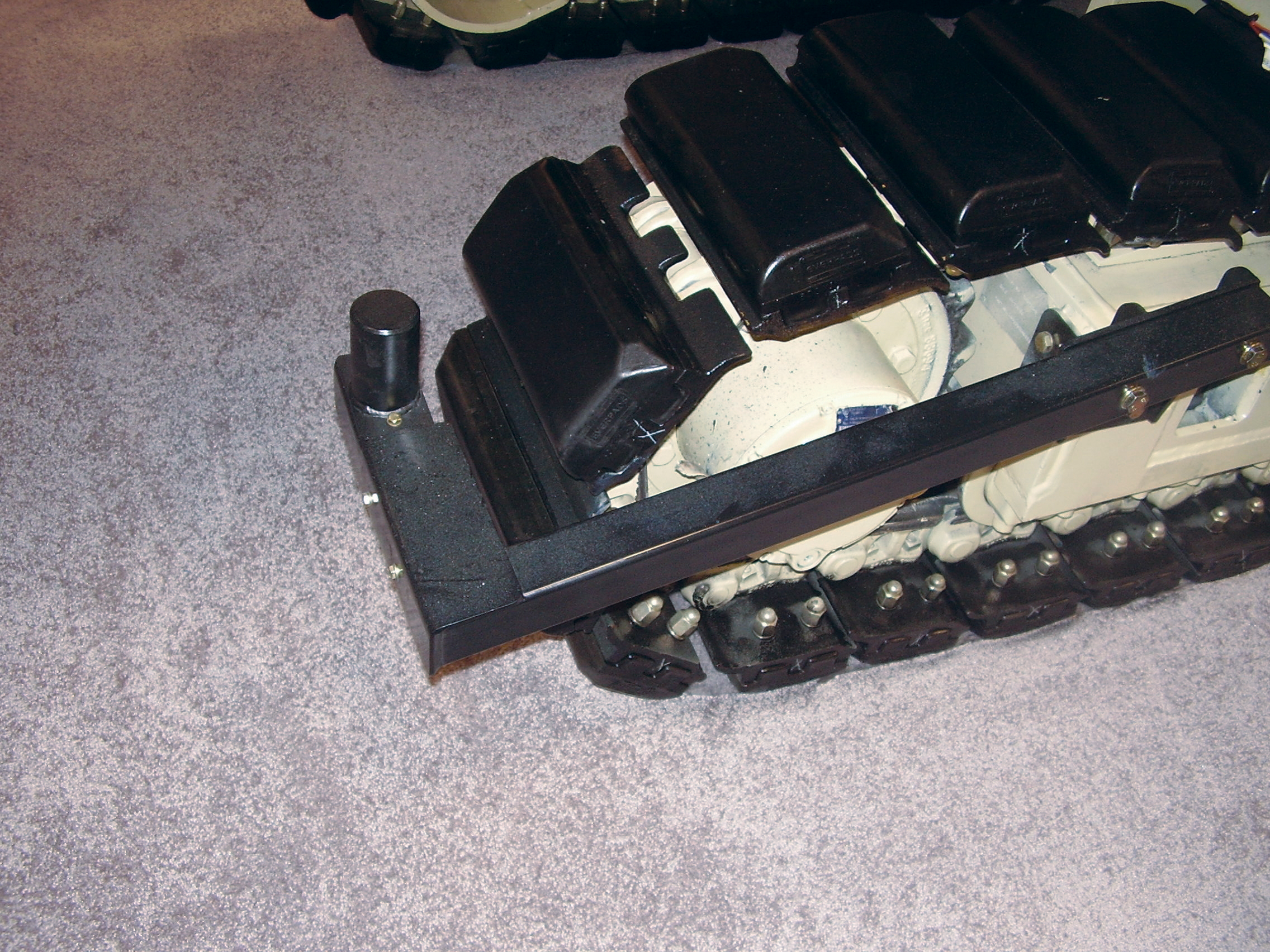 A sensor on the track assembly reduces the resk of on-site accidents track assembly sensor
