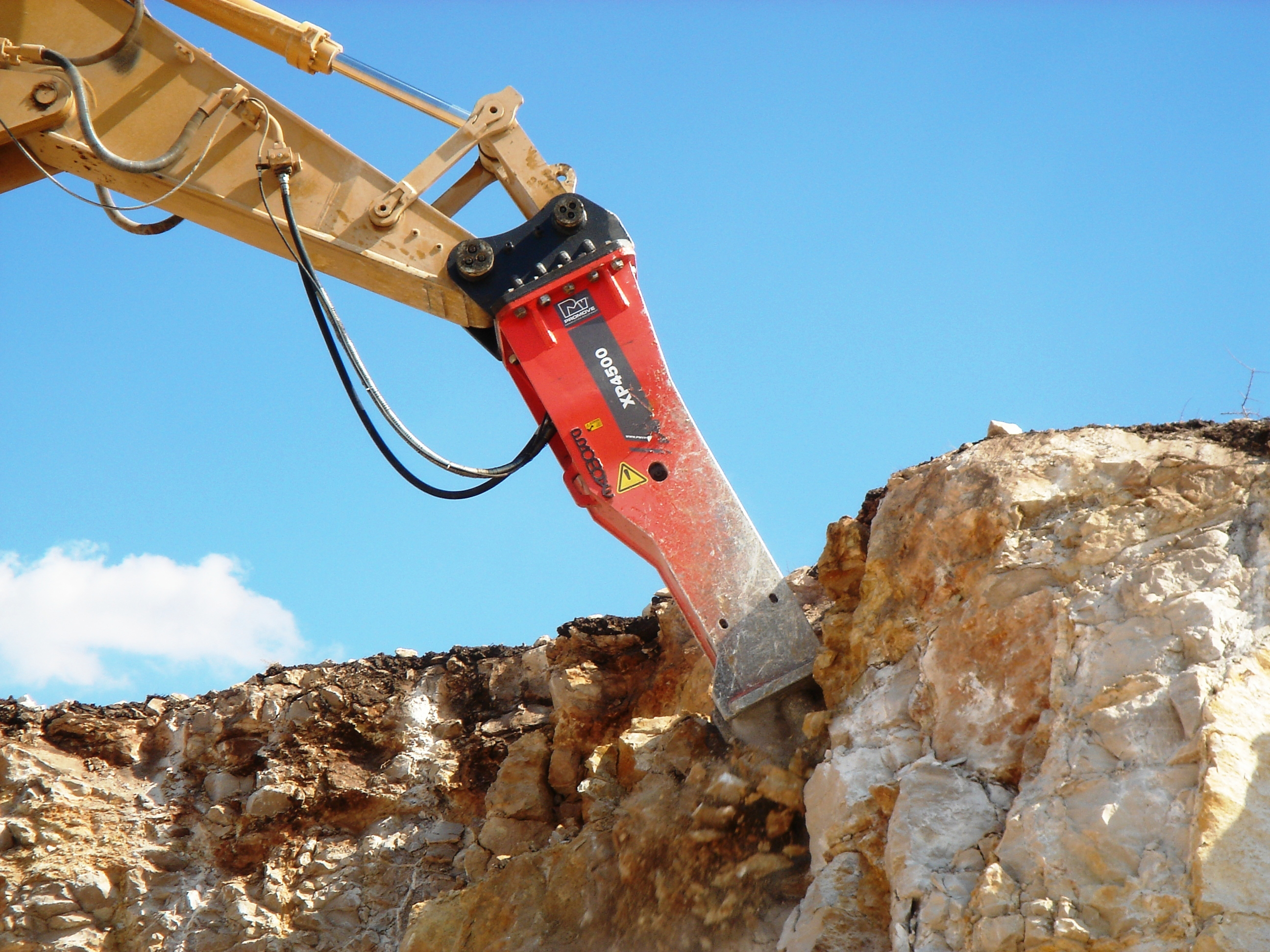 Promove has an extensive range of breakers as well as other attachments Promoe drilling into rocks