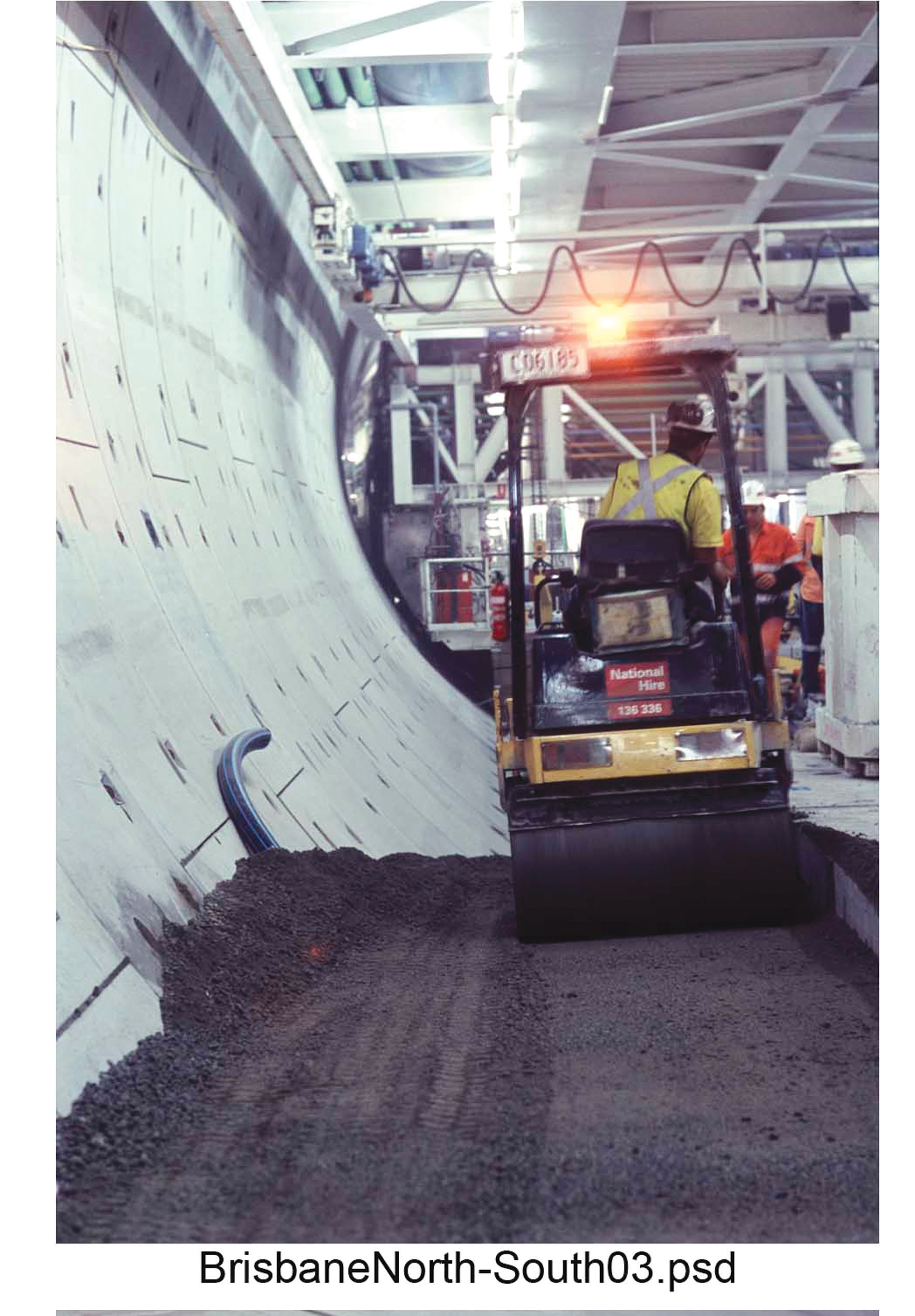The new tunnel link will be the longest in Australia when complete Roller flattening tarmac