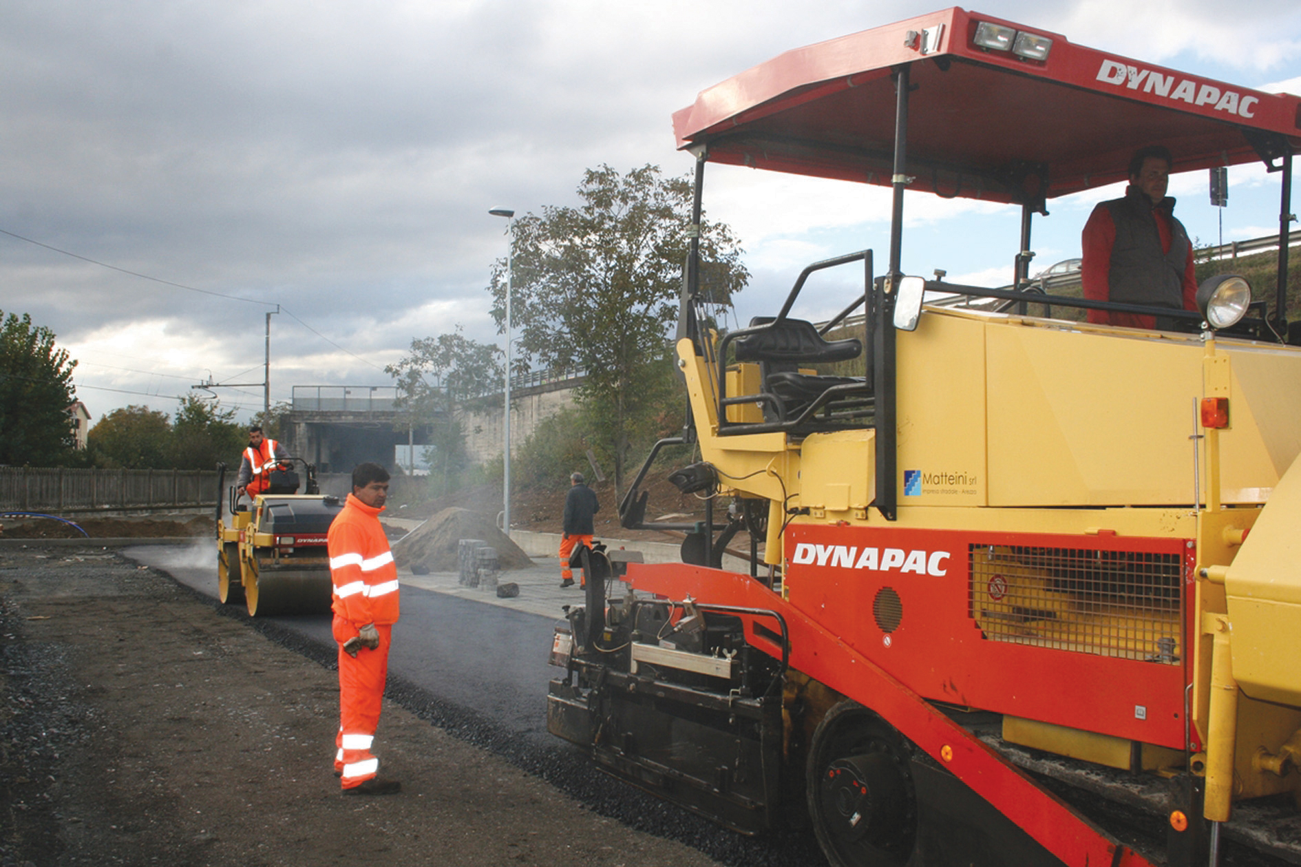 Matteini has also used its Dynapac F141CR paver and CC142 tandem roller on a new parking area job Paver working on road