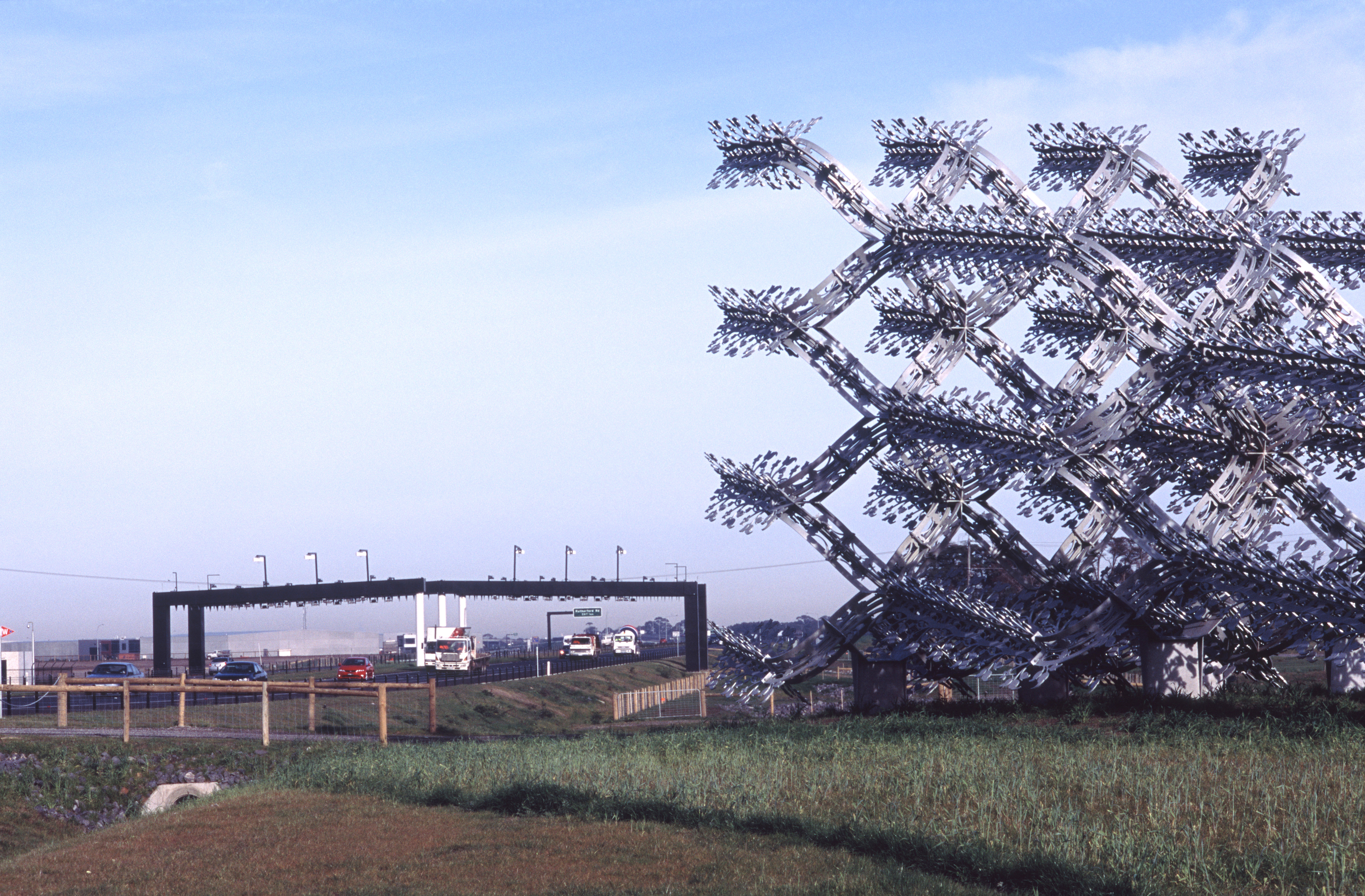 The design of the project has been augmented by environmental features and artworks Metal panneling around highways