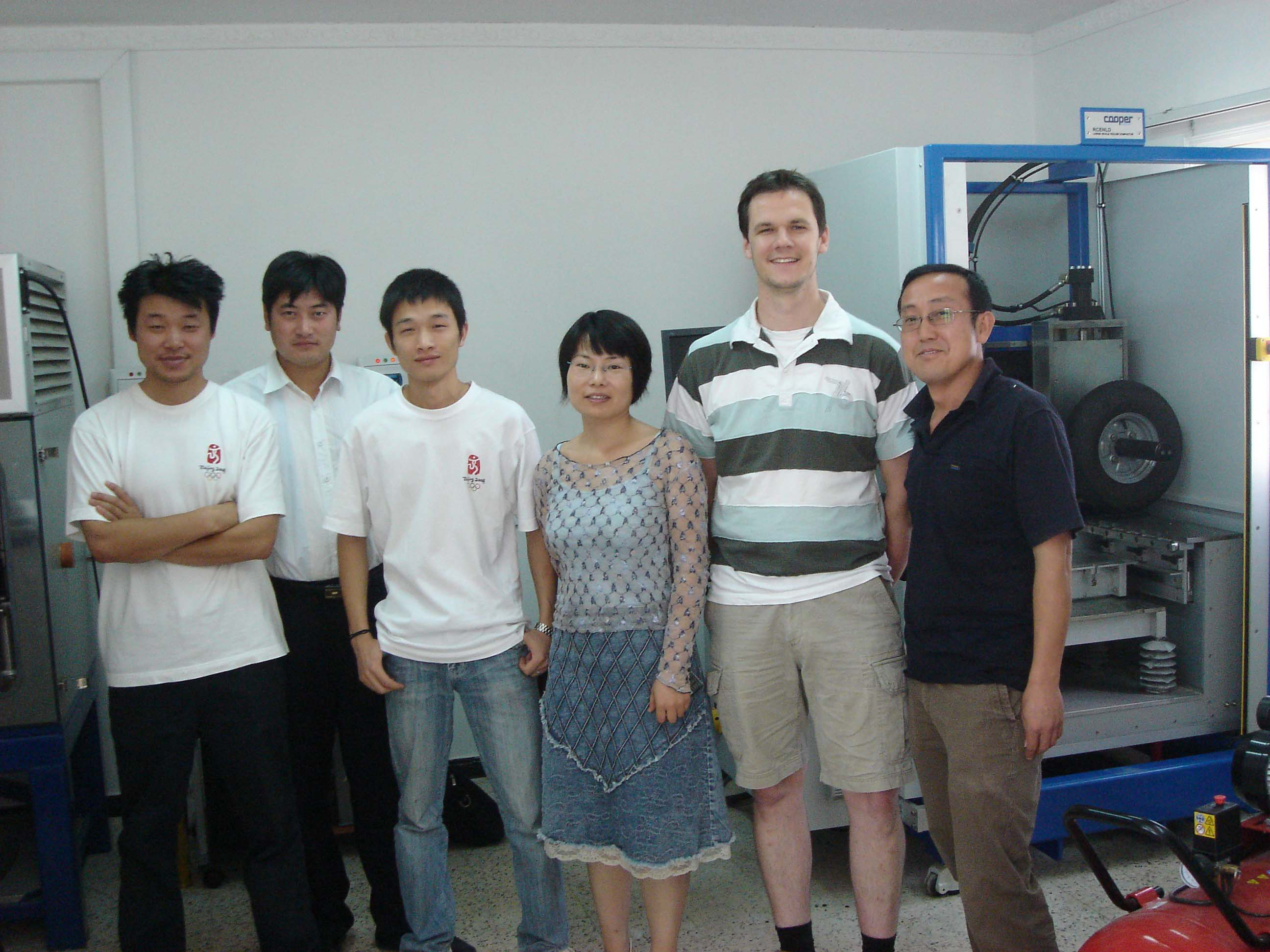Craig Walker with staff from the Jiangsu Transportation Research Institute (JSTRI) after training on Cooper Technology equipment at the central testing lab in Oran, Algeria staff from the Jiangsu Transportation Research Institute (JSTRI)