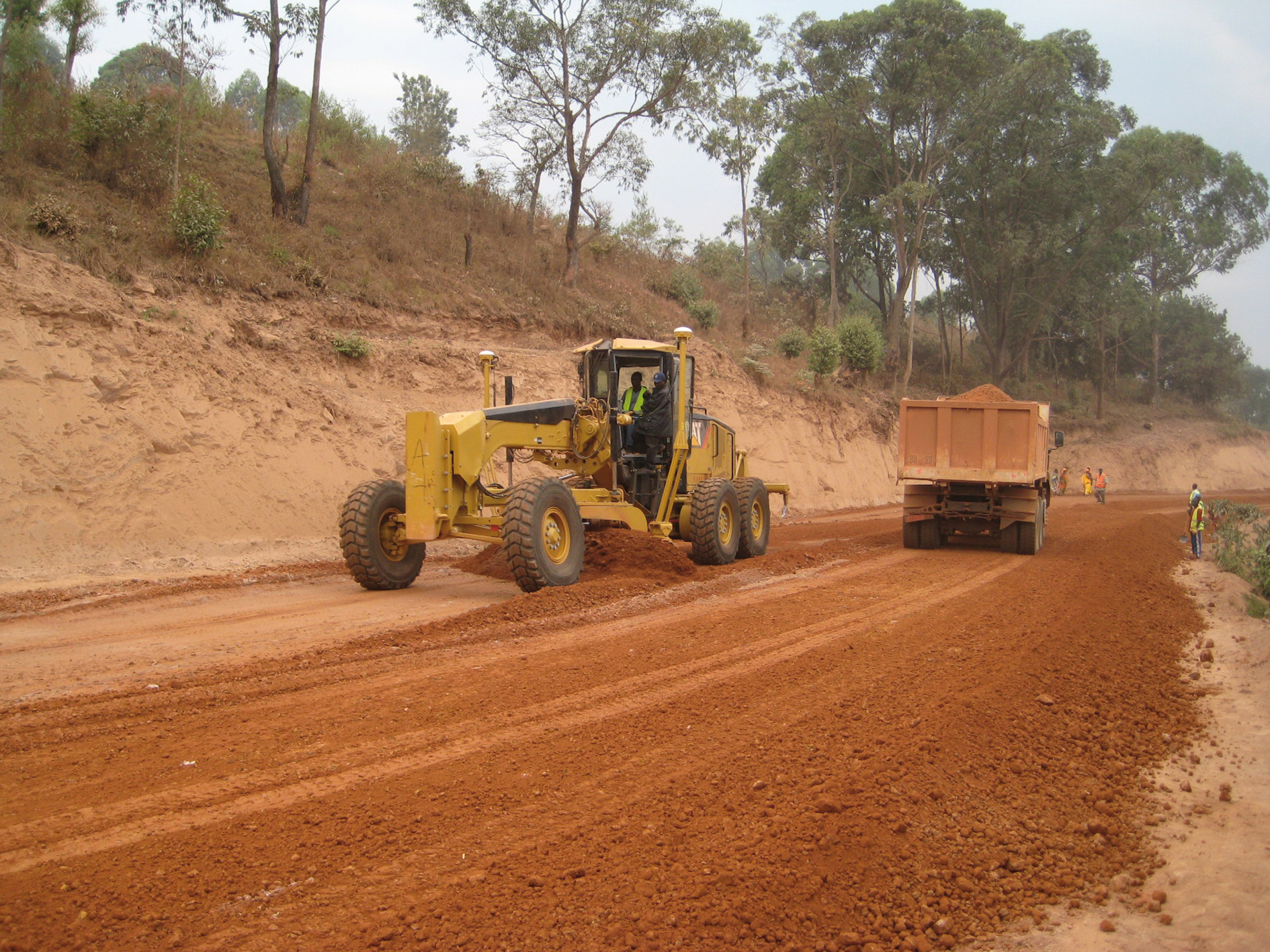 Linked with AccuGrade GPS machine control, Caterpillar's 14M is allowing the contractor to grade more.day compared to previous methods Grading in Africa