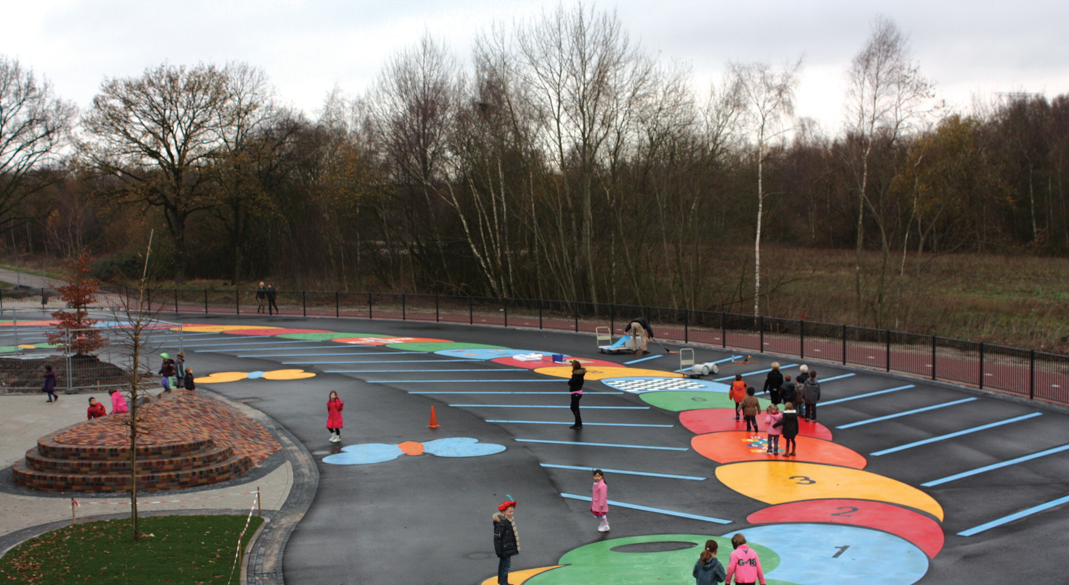 DecoMark from LKF used in playground/parking space application is made from a thin material preformed thermoplastic material Playground painted by DecoMark