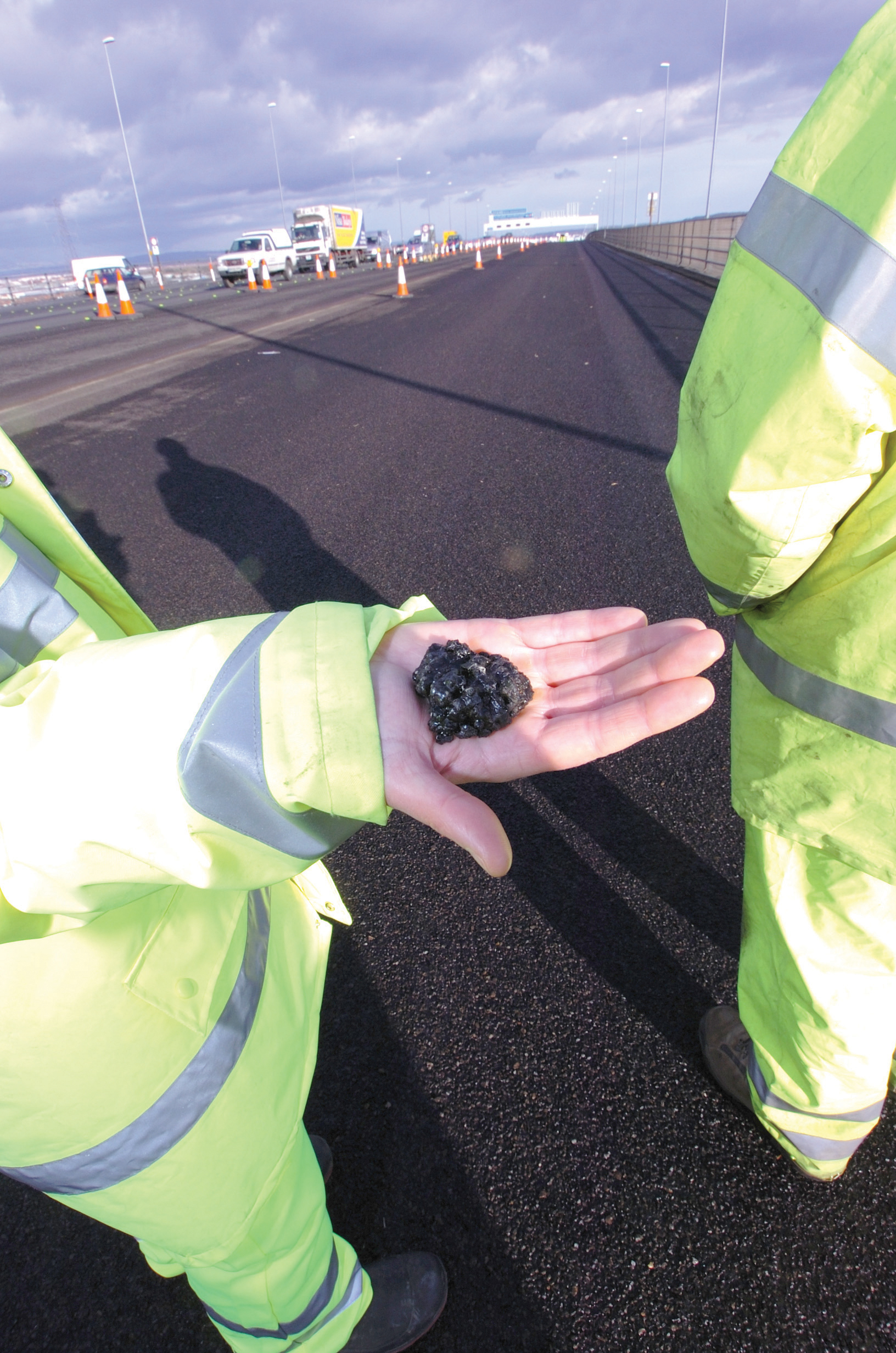 Ashpalt with a high-tech bitumen binder being laid as surfacing on the 'lively' Avonmouth bridge High-tech bitumen binder in use