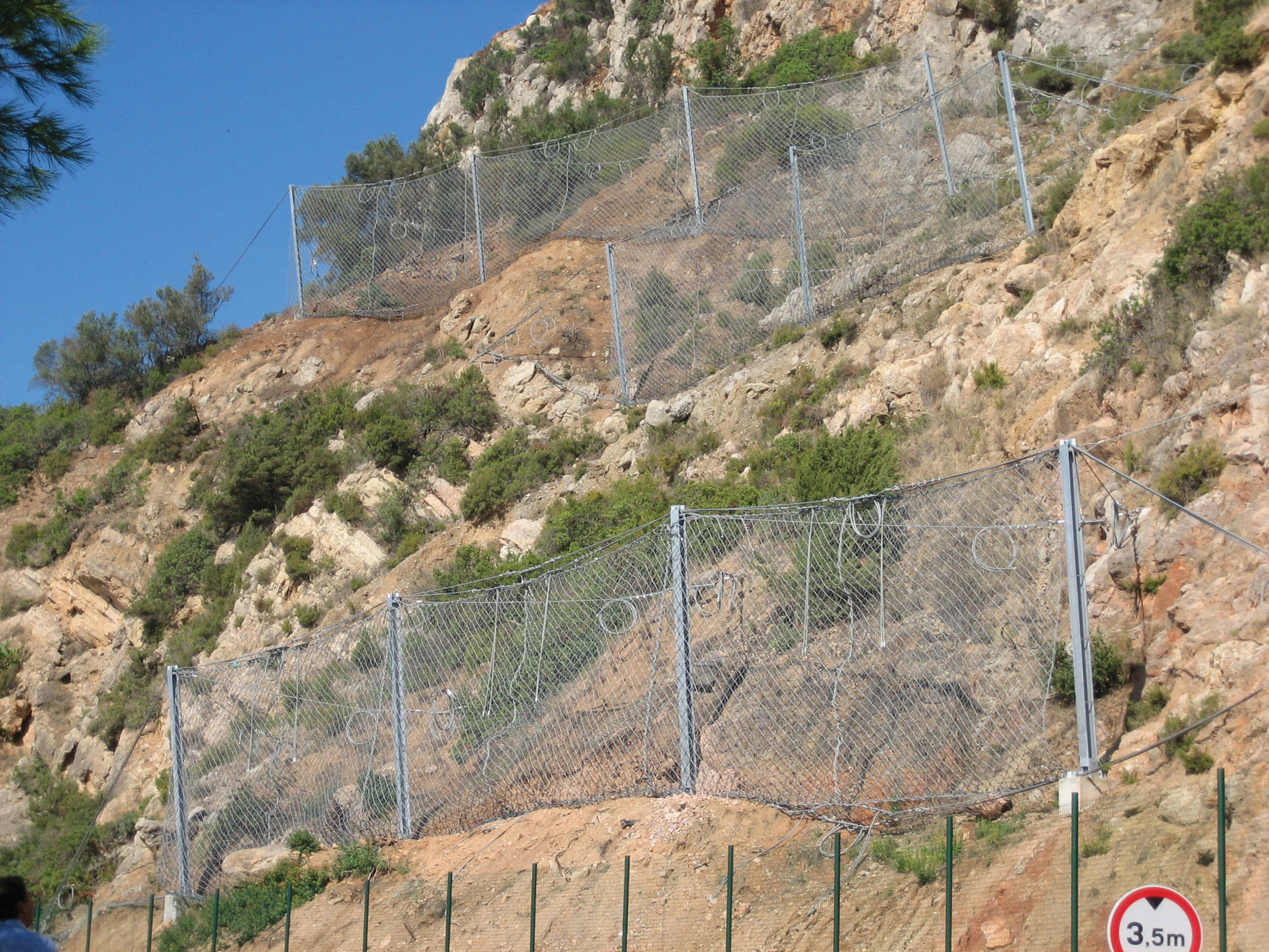 Rud's Barriertech can protect highways and rail tracks from stray boulders, landslides and avalanches Tud's Barriertech installed on cliffs