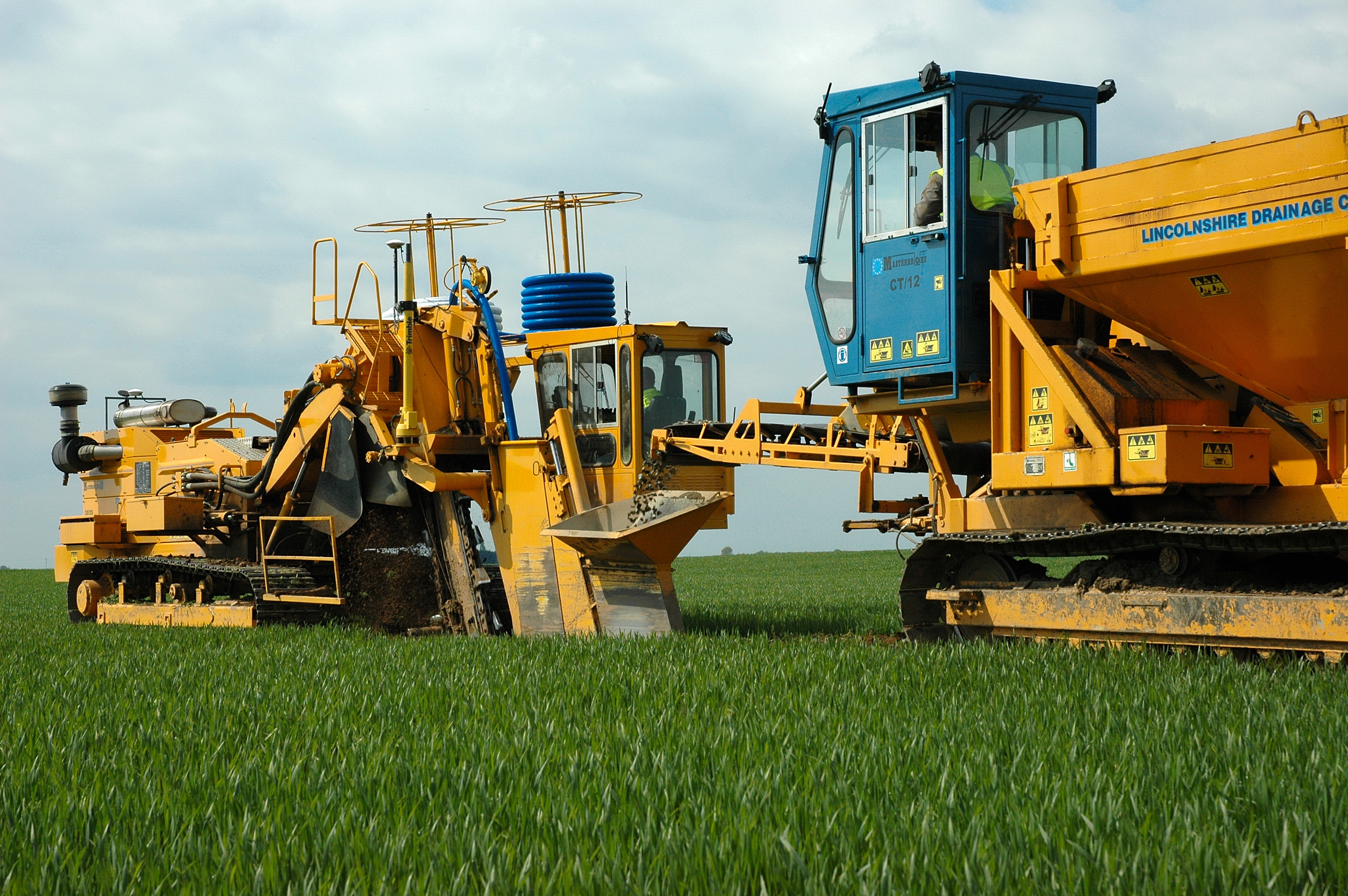 A sophisticated control system allows fast and accurate construction of roadside drainage trenches GPS system for trenching