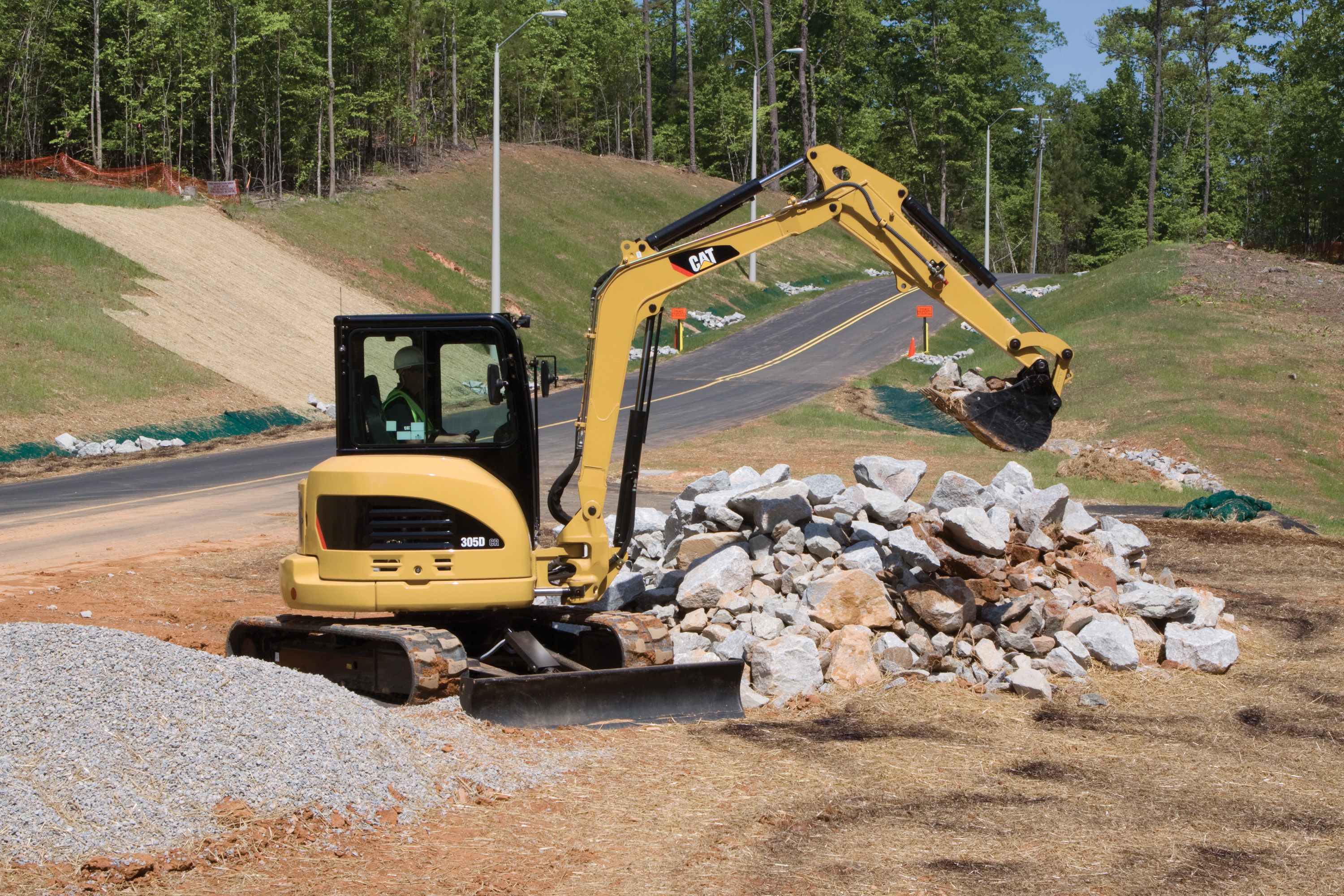 On duty: the 305D CR,one of Caterpillar's new D Series mini hydraulic excavators Cat's new mini excavators