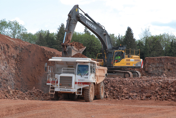 One of CPI's Perlini DP405 rigid dump trucks being loaded by a Volvo excavator CPI's Perlini DP405 and Volvo excavator