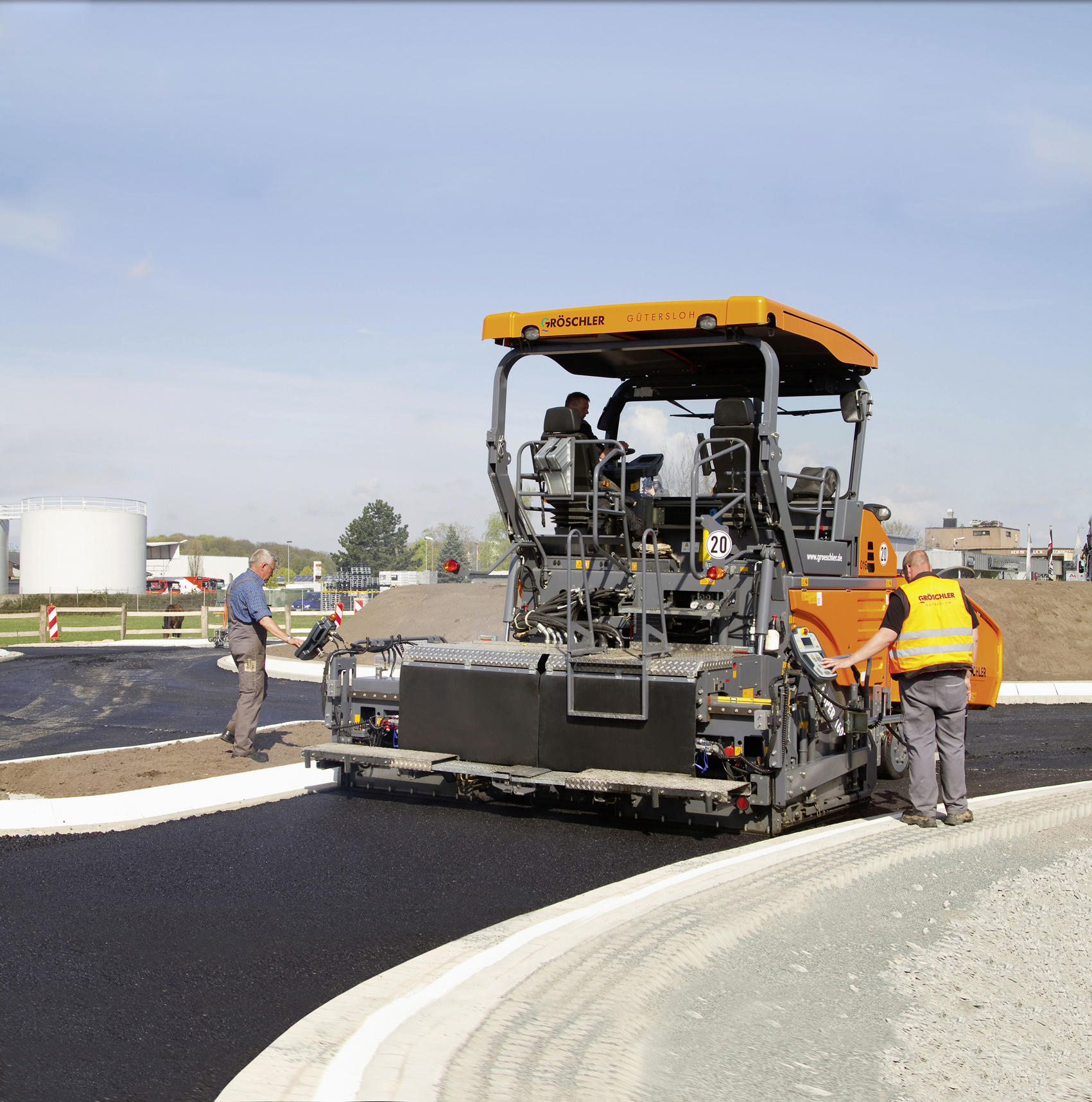 The Vogele pavers were able to handle tight radius curves on the project Vogele Paver