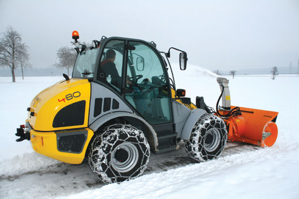 A Kramer machine on snow clearing duty Kramer 480 Snow clearing