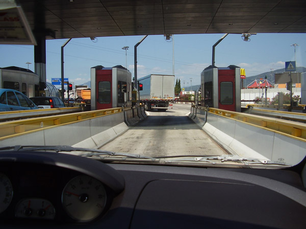 Tolling is used to fund highway development in some developed and developing nations Tolling station