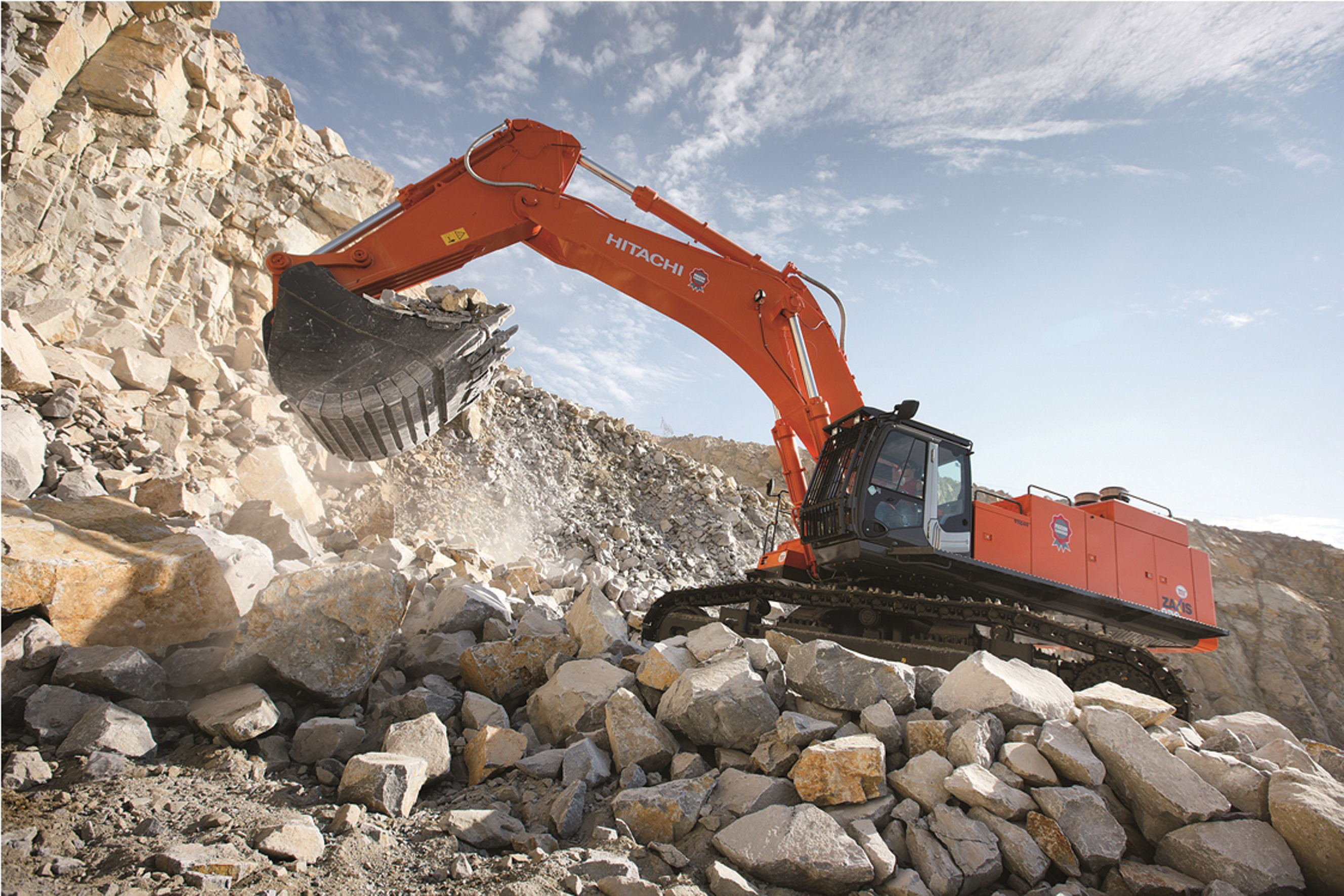 Hitachi excavators are being used at a Pigeon Carrières granite quarry Hitachi excavator